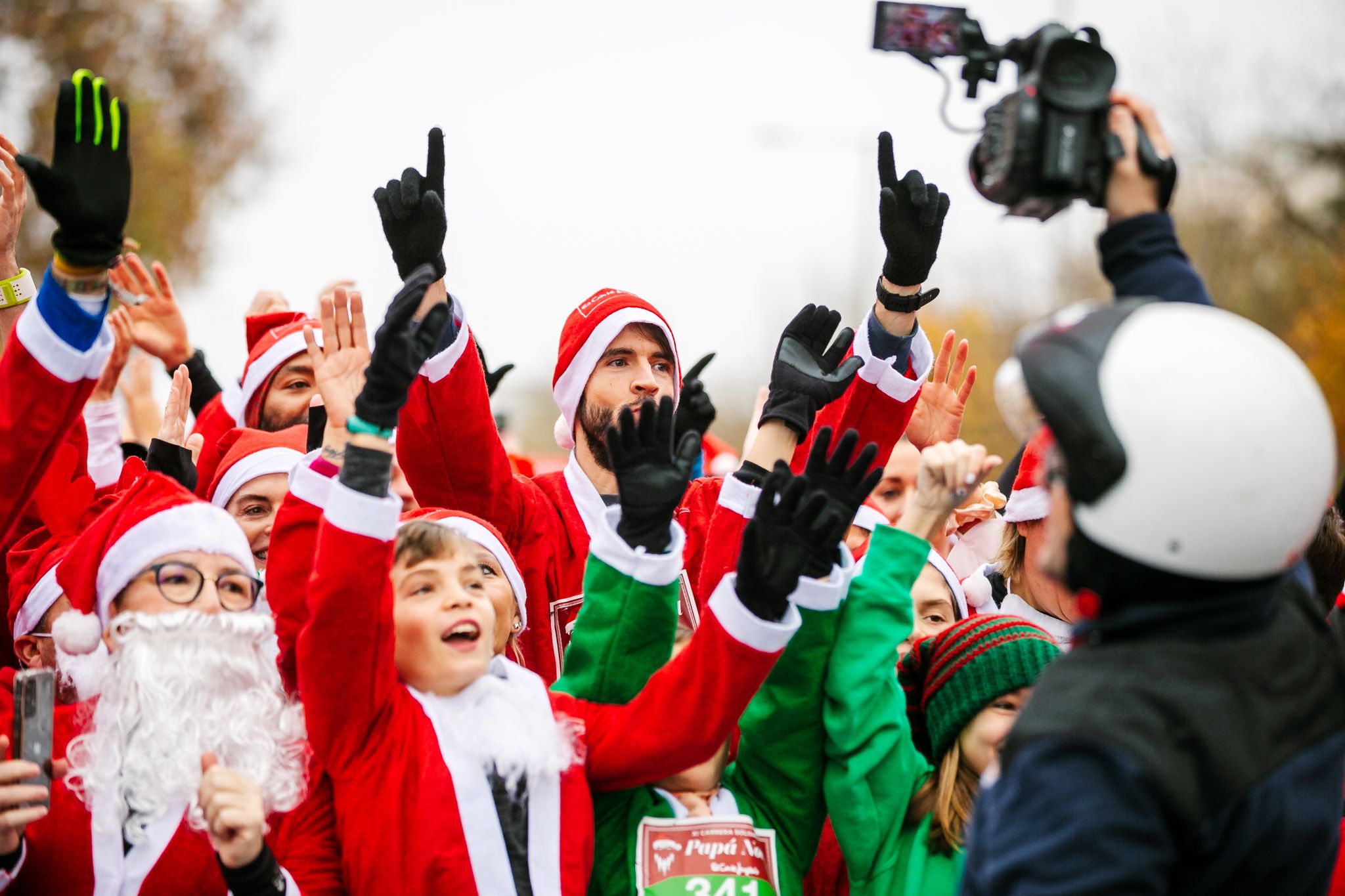 Las mejores fotos de la salida de la Carrera de Papá Noel El Corte Inglés 2022.