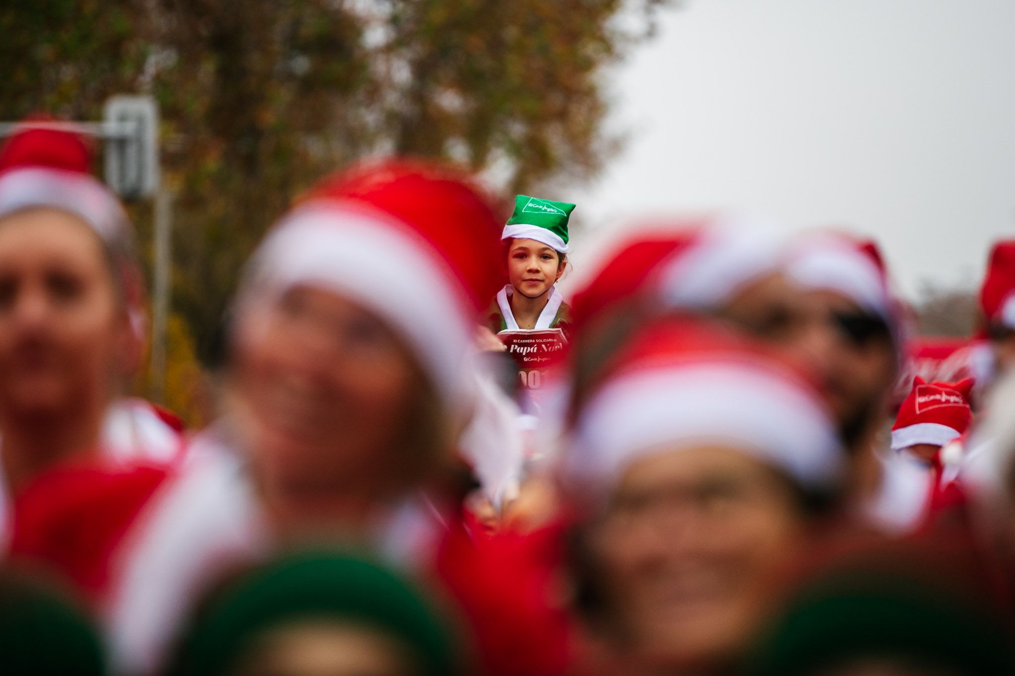 Las mejores fotos de la salida de la Carrera de Papá Noel El Corte Inglés 2022.