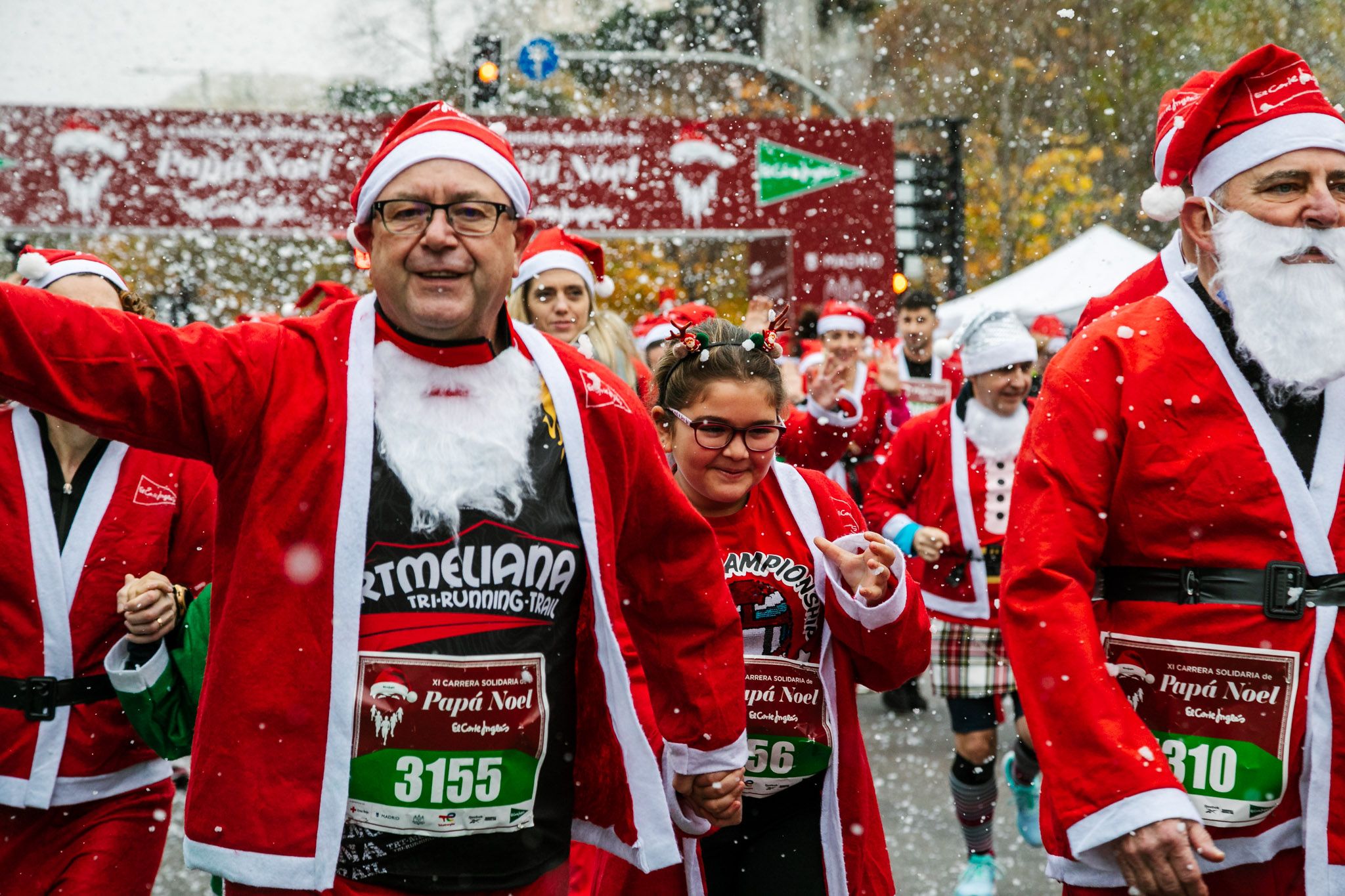 Las mejores fotos de la salida de la Carrera de Papá Noel El Corte Inglés 2022.