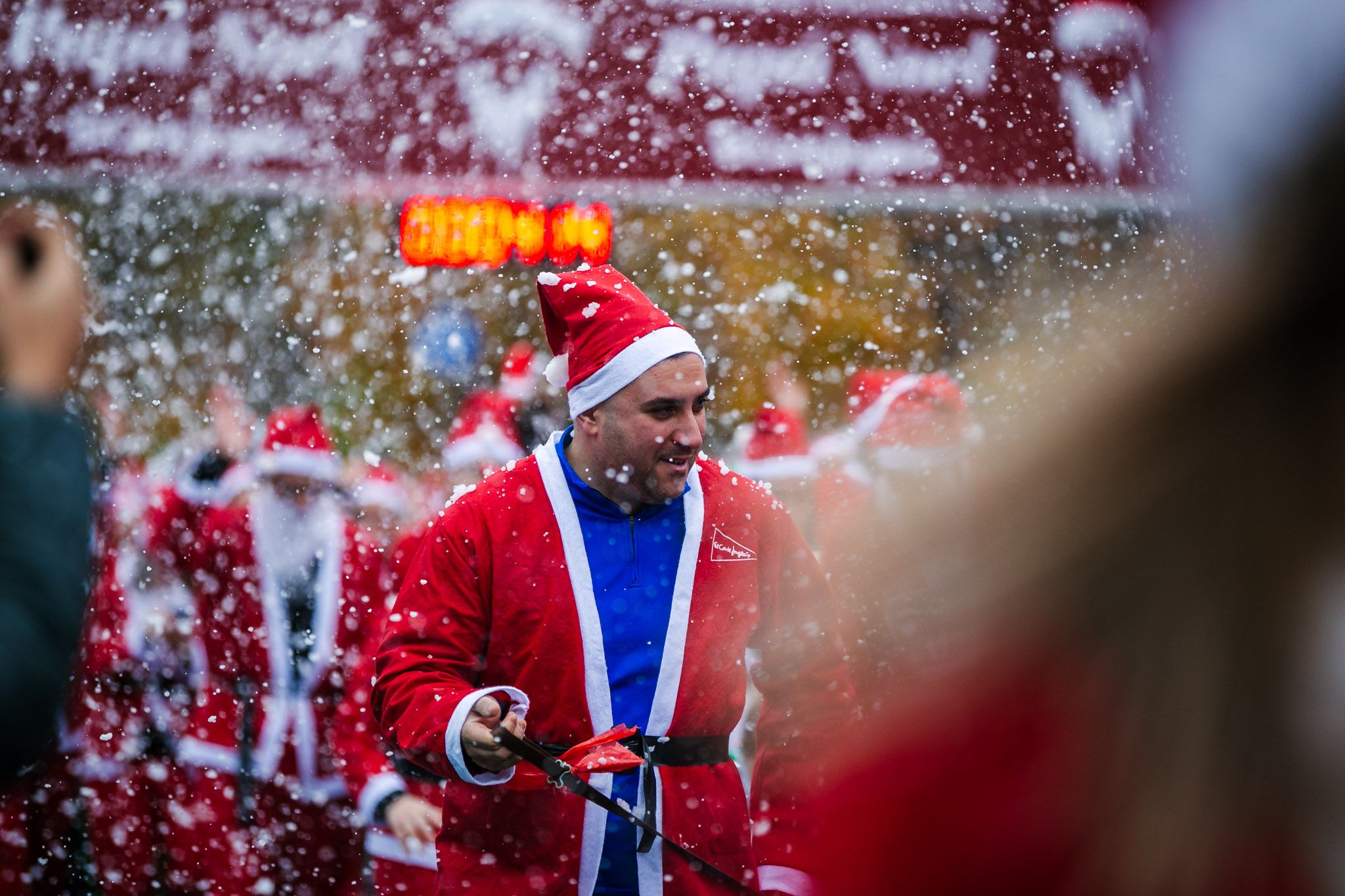 Las mejores fotos de la salida de la Carrera de Papá Noel El Corte Inglés 2022.