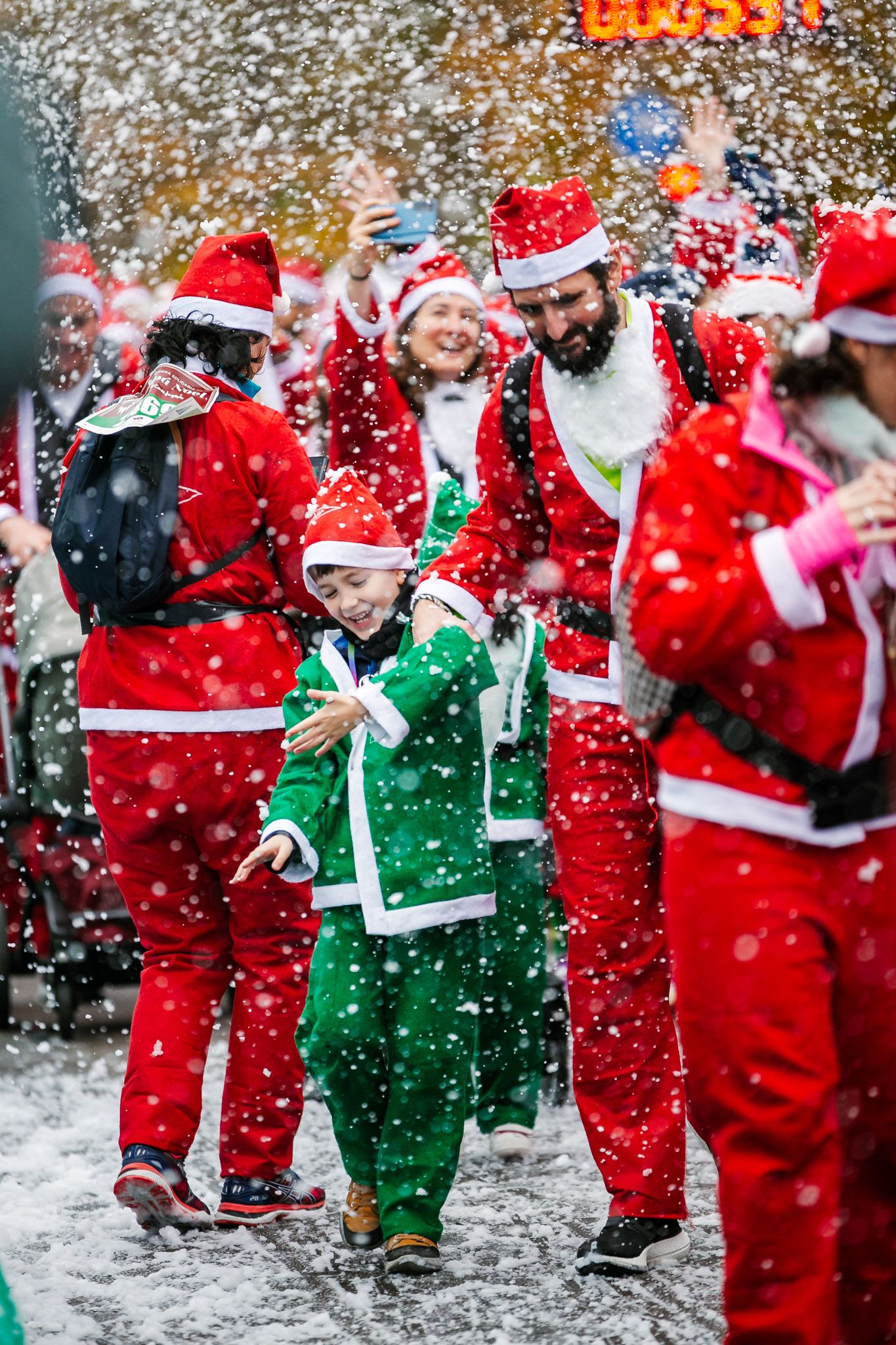 Las mejores fotos de la salida de la Carrera de Papá Noel El Corte Inglés 2022.