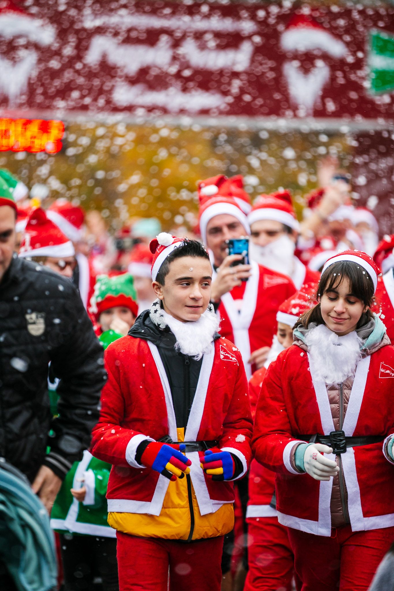 Las mejores fotos de la salida de la Carrera de Papá Noel El Corte Inglés 2022.