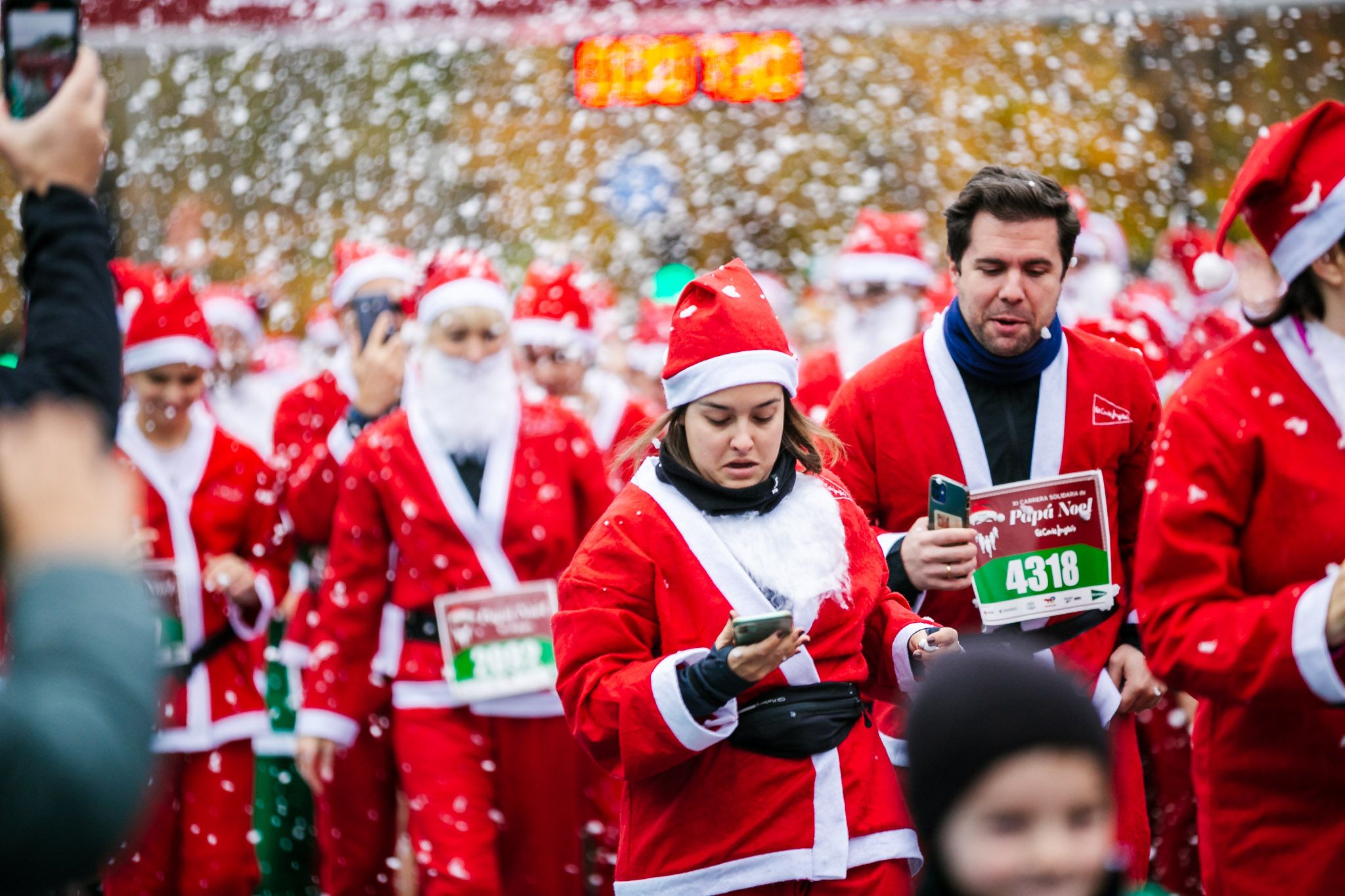 Las mejores fotos de la salida de la Carrera de Papá Noel El Corte Inglés 2022.