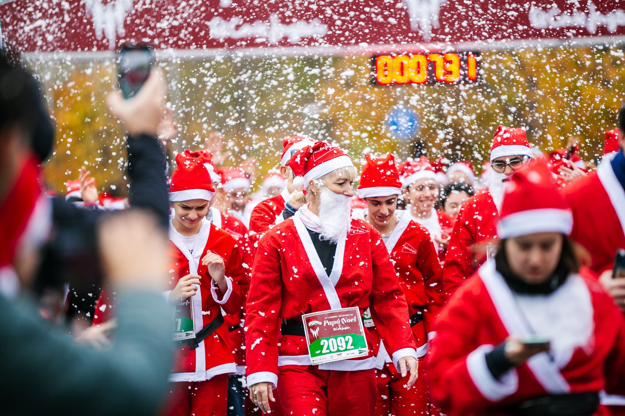 Las mejores fotos de la salida de la Carrera de Papá Noel El Corte Inglés 2022.