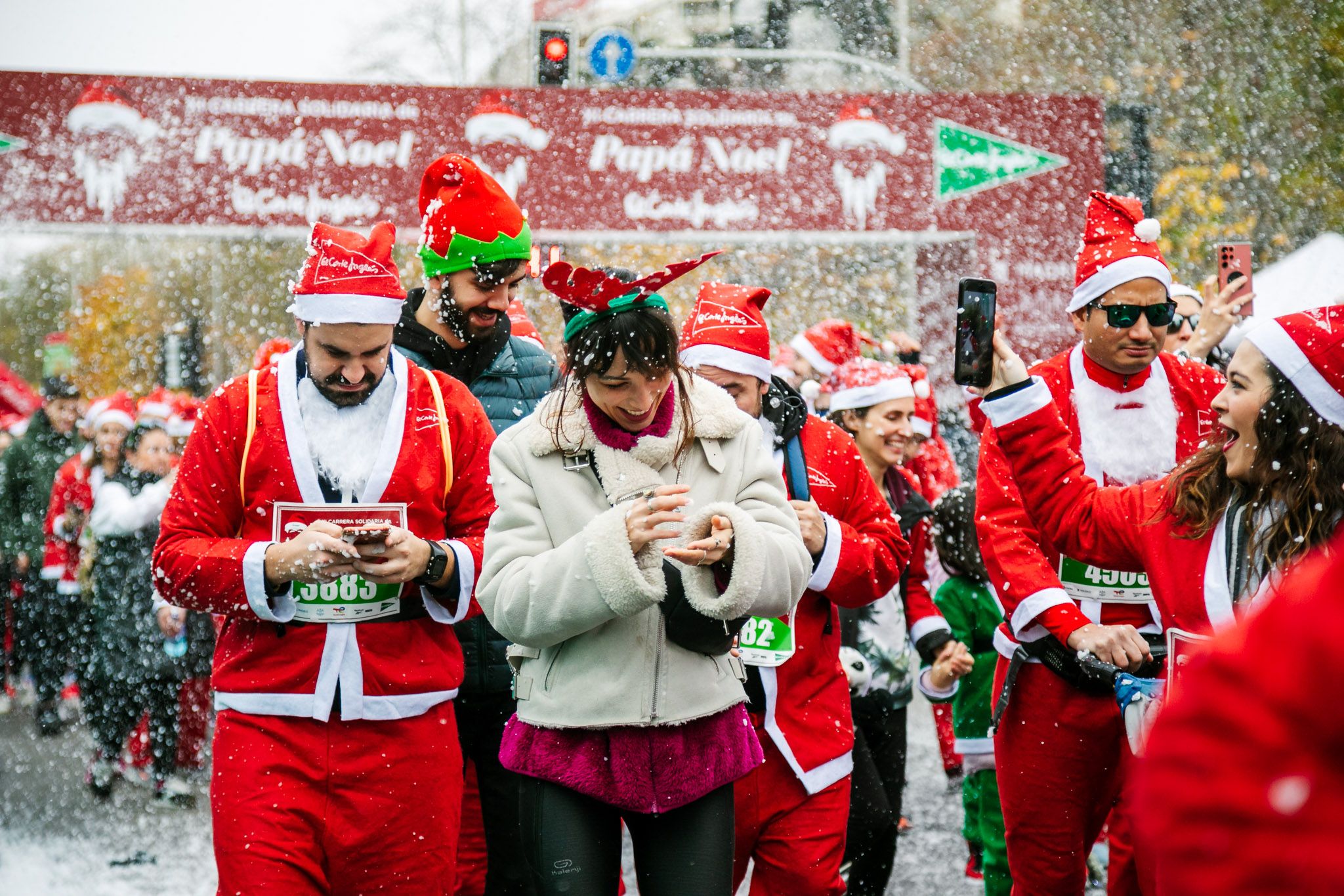 Las mejores fotos de la salida de la Carrera de Papá Noel El Corte Inglés 2022.