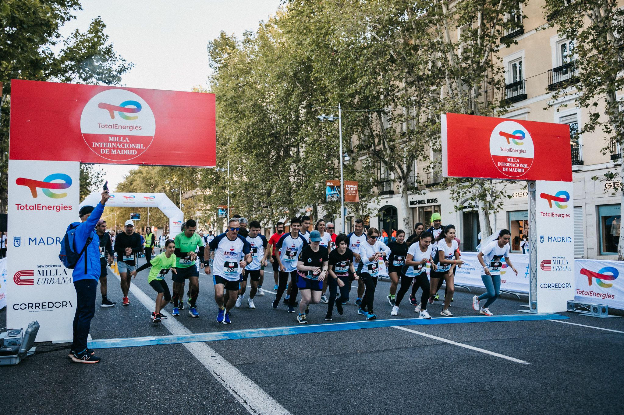 Las mejores fotos de las carreras populares en la TotalEnergies Milla Internacional de Madrid 2023. (65)