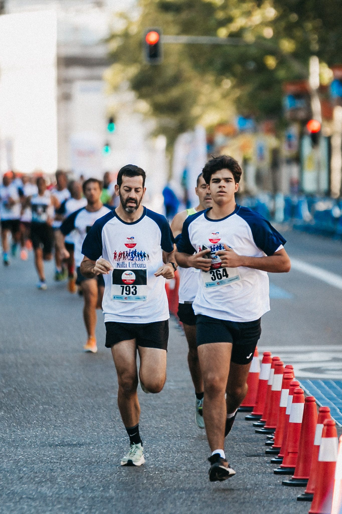 Las mejores fotos de las carreras populares en la TotalEnergies Milla Internacional de Madrid 2023. (110)
