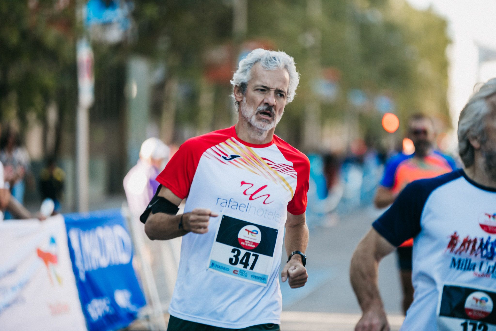 Las mejores fotos de las carreras populares en la TotalEnergies Milla Internacional de Madrid 2023. (113)