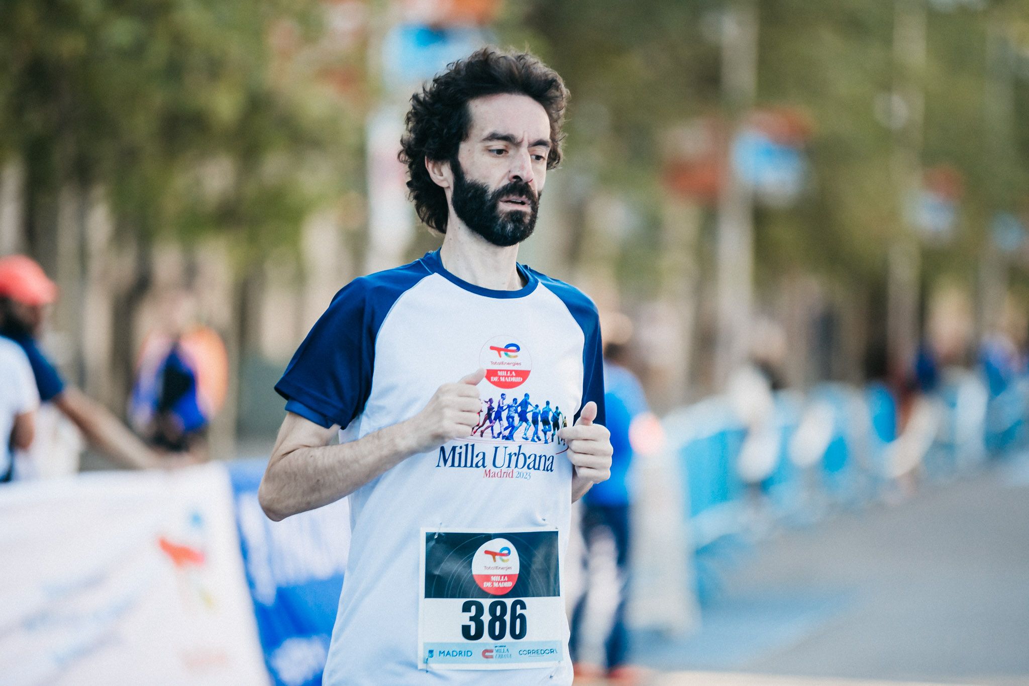 Las mejores fotos de las carreras populares en la TotalEnergies Milla Internacional de Madrid 2023. (124)