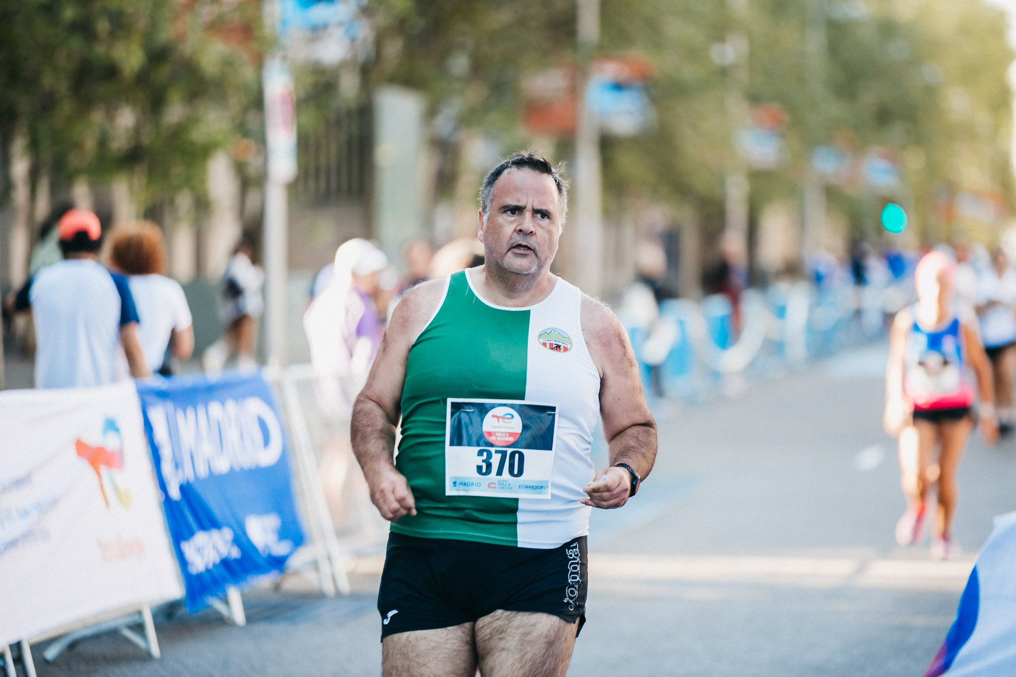 Las mejores fotos de las carreras populares en la TotalEnergies Milla Internacional de Madrid 2023. (125)