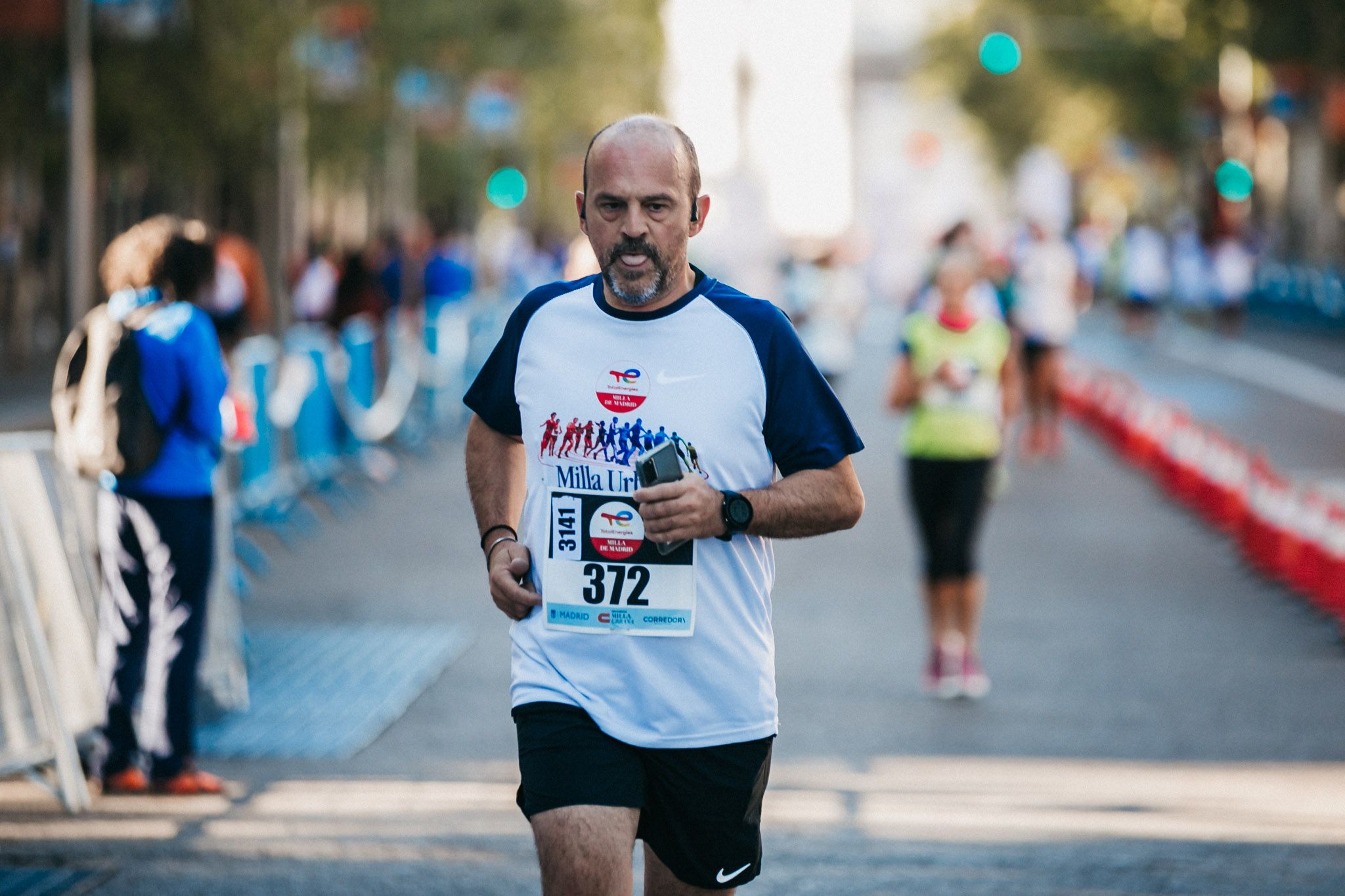 Las mejores fotos de las carreras populares en la TotalEnergies Milla Internacional de Madrid 2023. (142)