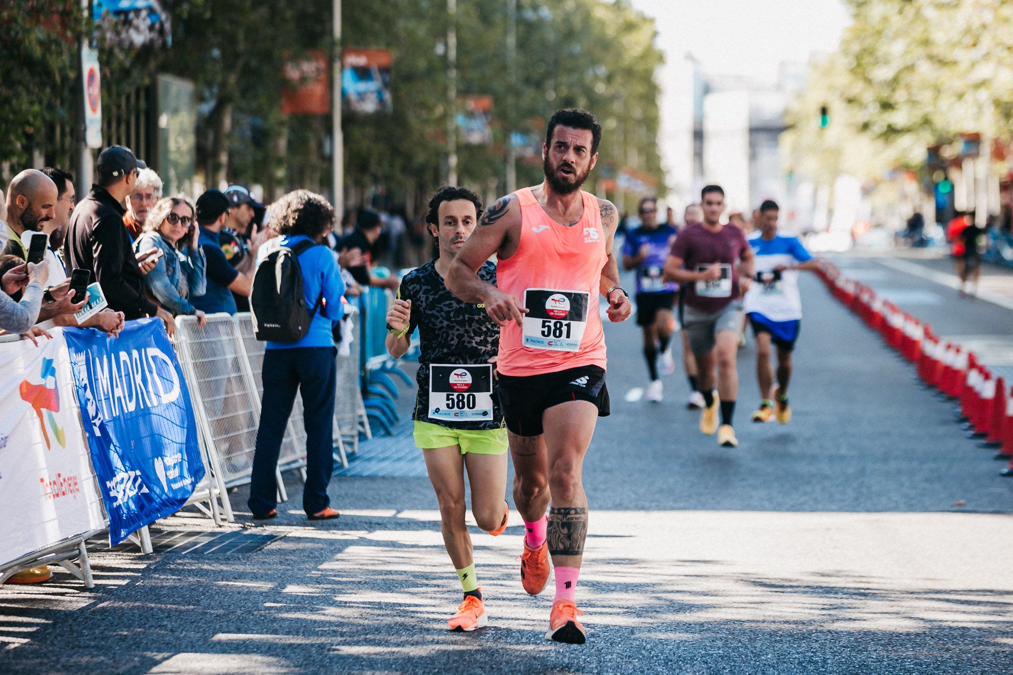 Las mejores fotos de las carreras populares en la TotalEnergies Milla de Madrid 2023. (137)