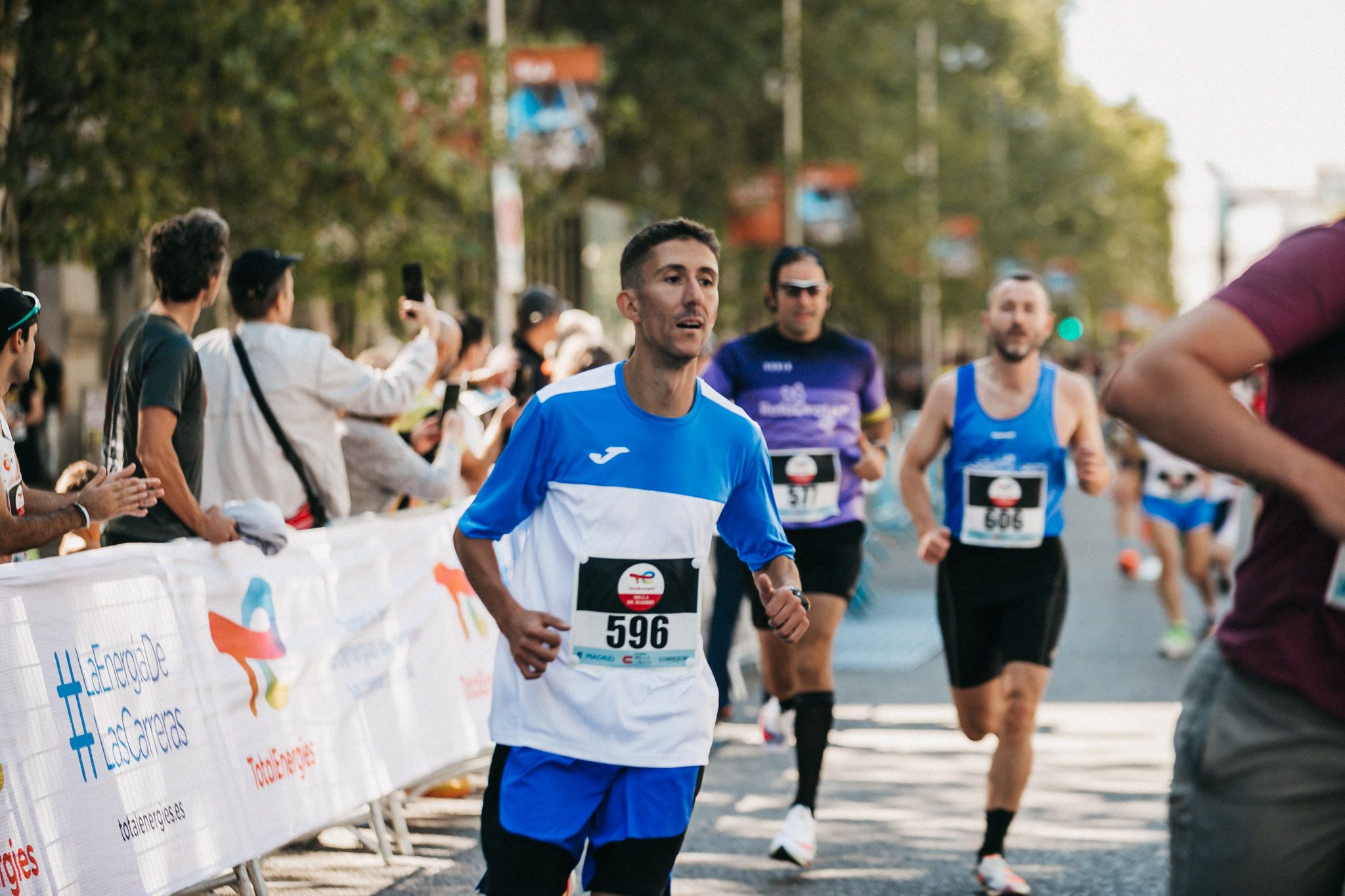 Las mejores fotos de las carreras populares en la TotalEnergies Milla de Madrid 2023. (140)