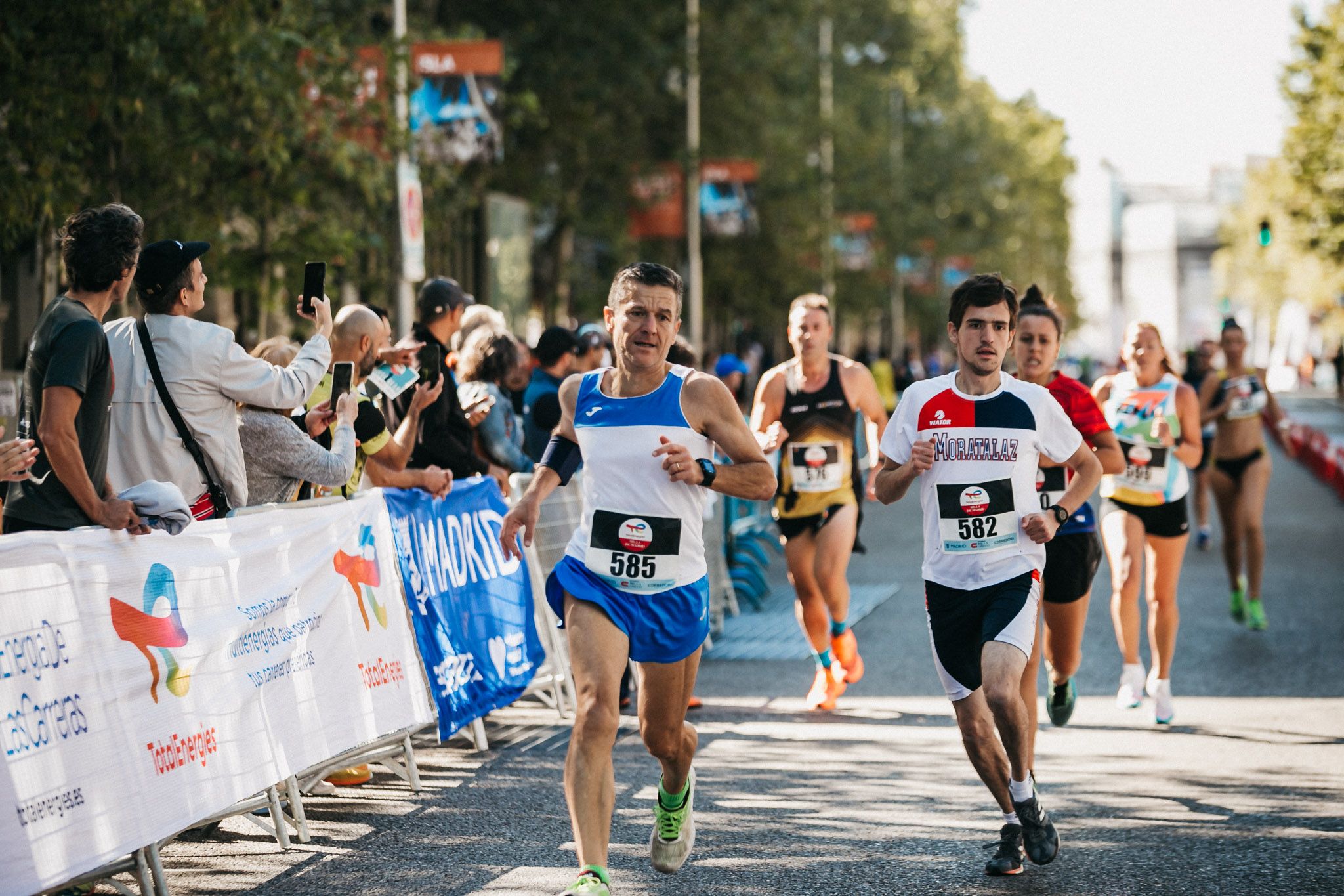 Las mejores fotos de las carreras populares en la TotalEnergies Milla de Madrid 2023. (142)