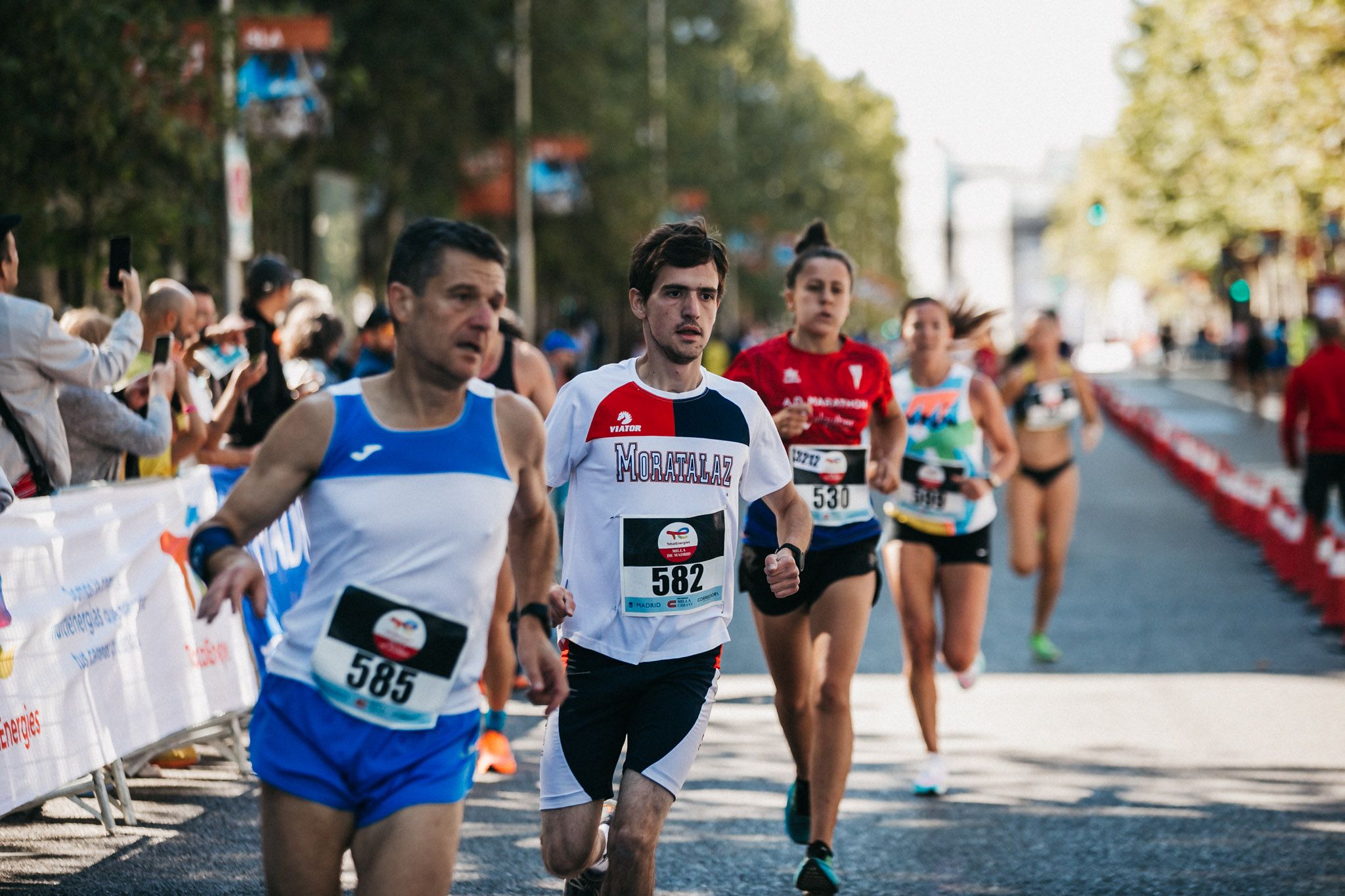 Las mejores fotos de las carreras populares en la TotalEnergies Milla de Madrid 2023. (143)