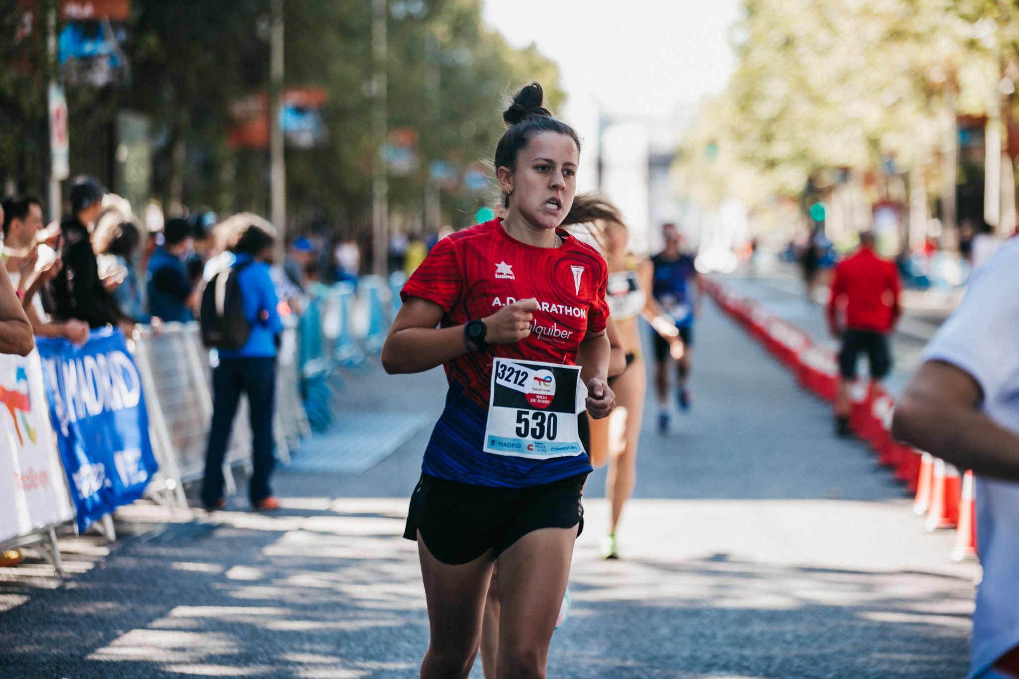Las mejores fotos de las carreras populares en la TotalEnergies Milla de Madrid 2023. (144)