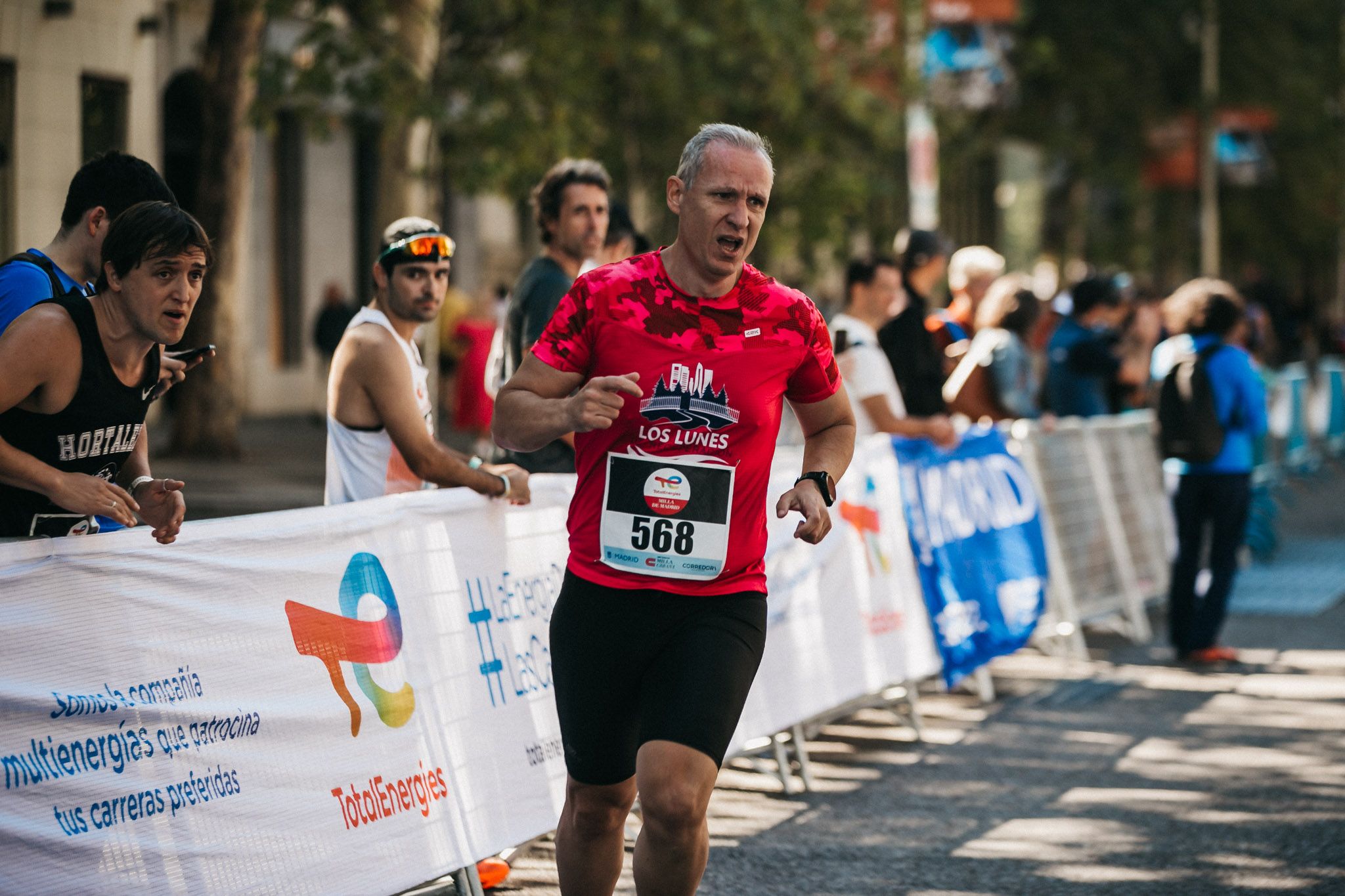 Las mejores fotos de las carreras populares en la TotalEnergies Milla de Madrid 2023. (146)