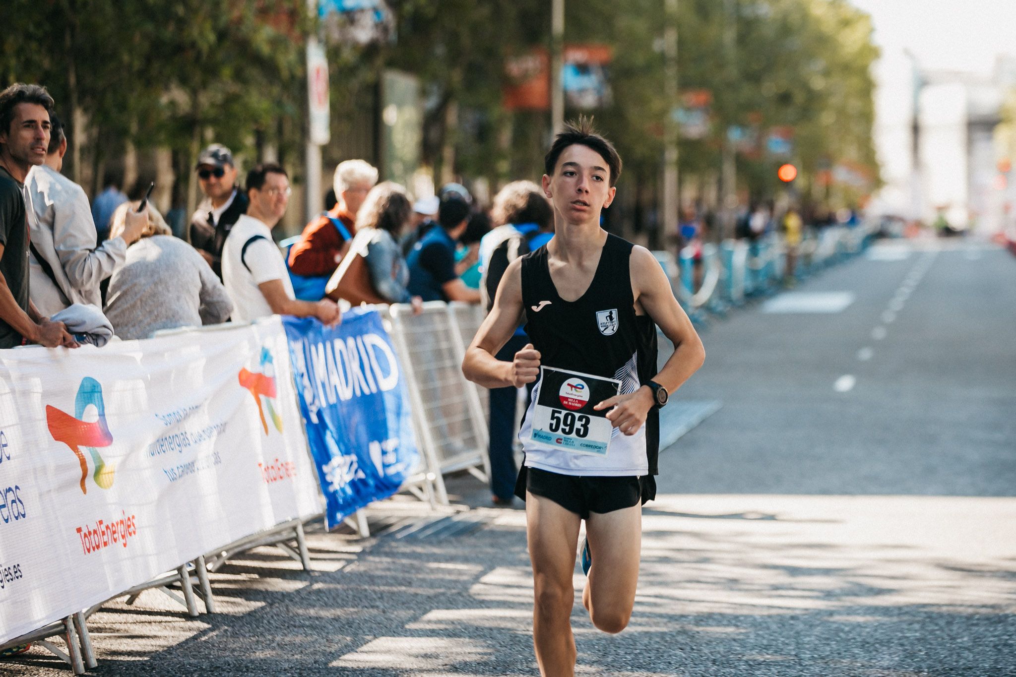 Las mejores fotos de las carreras populares en la TotalEnergies Milla de Madrid 2023. (147)