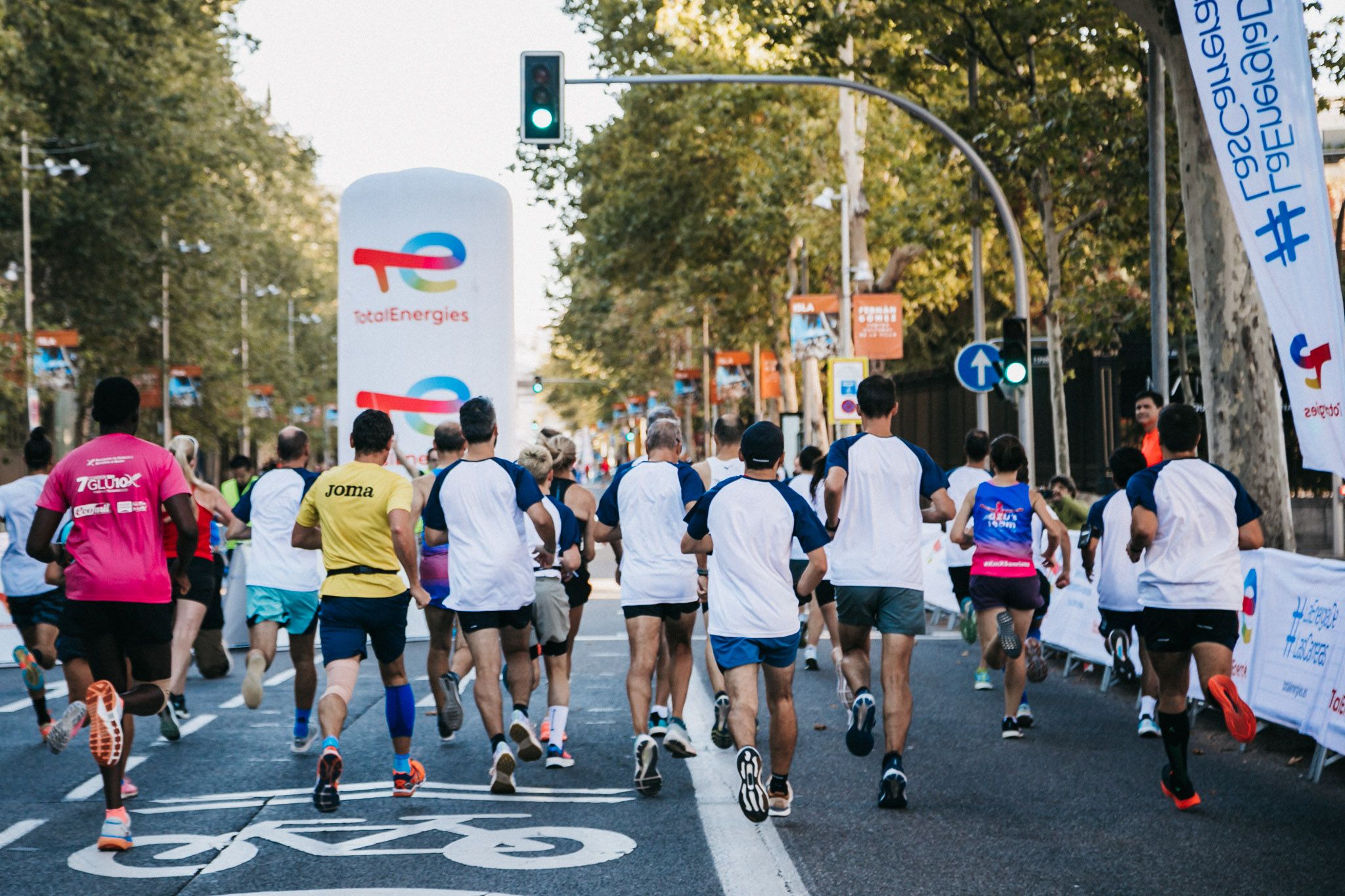 Las mejores fotos de las carreras populares en la TotalEnergies Milla Internacional de Madrid 2023. (173)