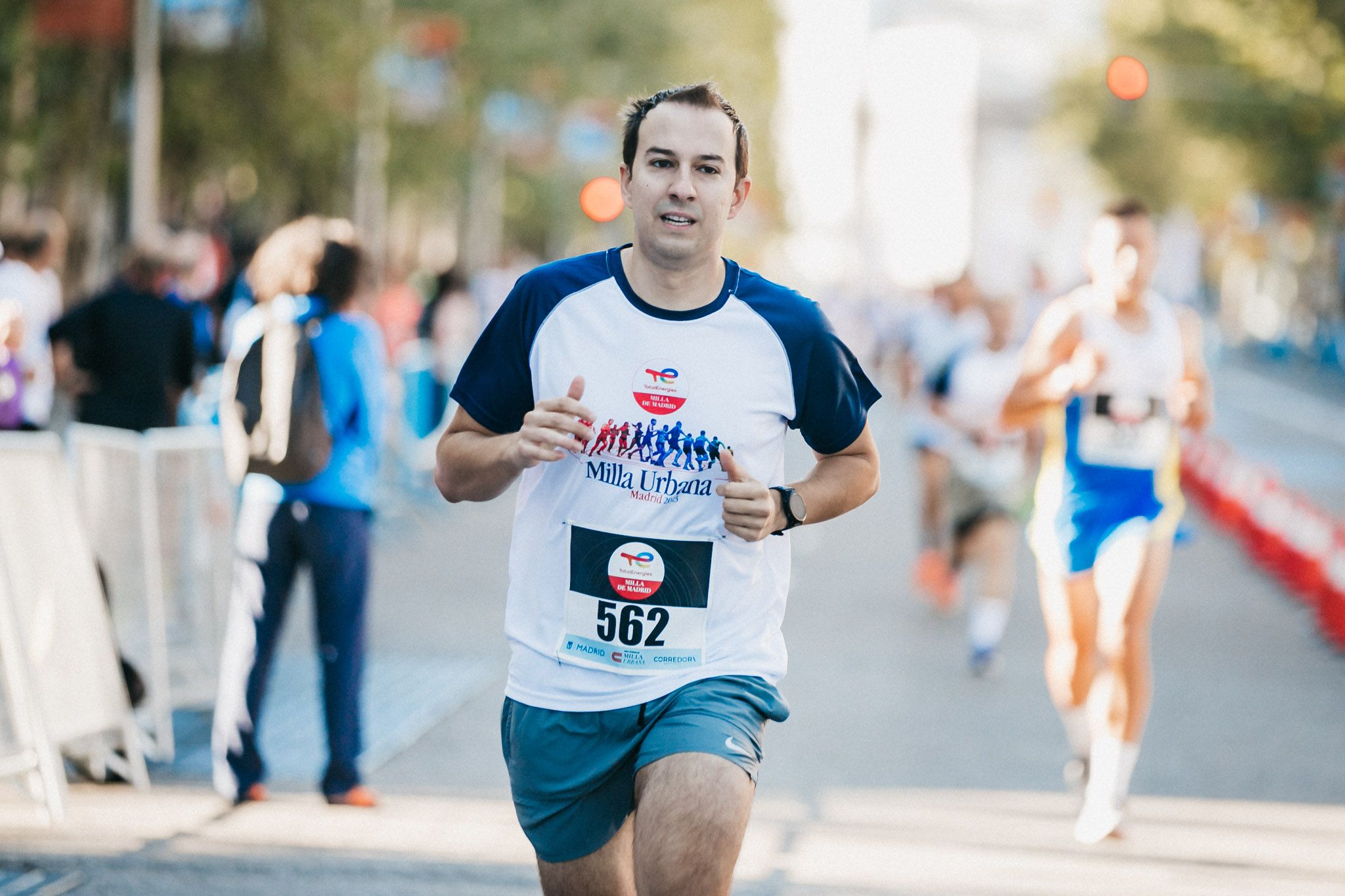Las mejores fotos de las carreras populares en la TotalEnergies Milla Internacional de Madrid 2023. (174)