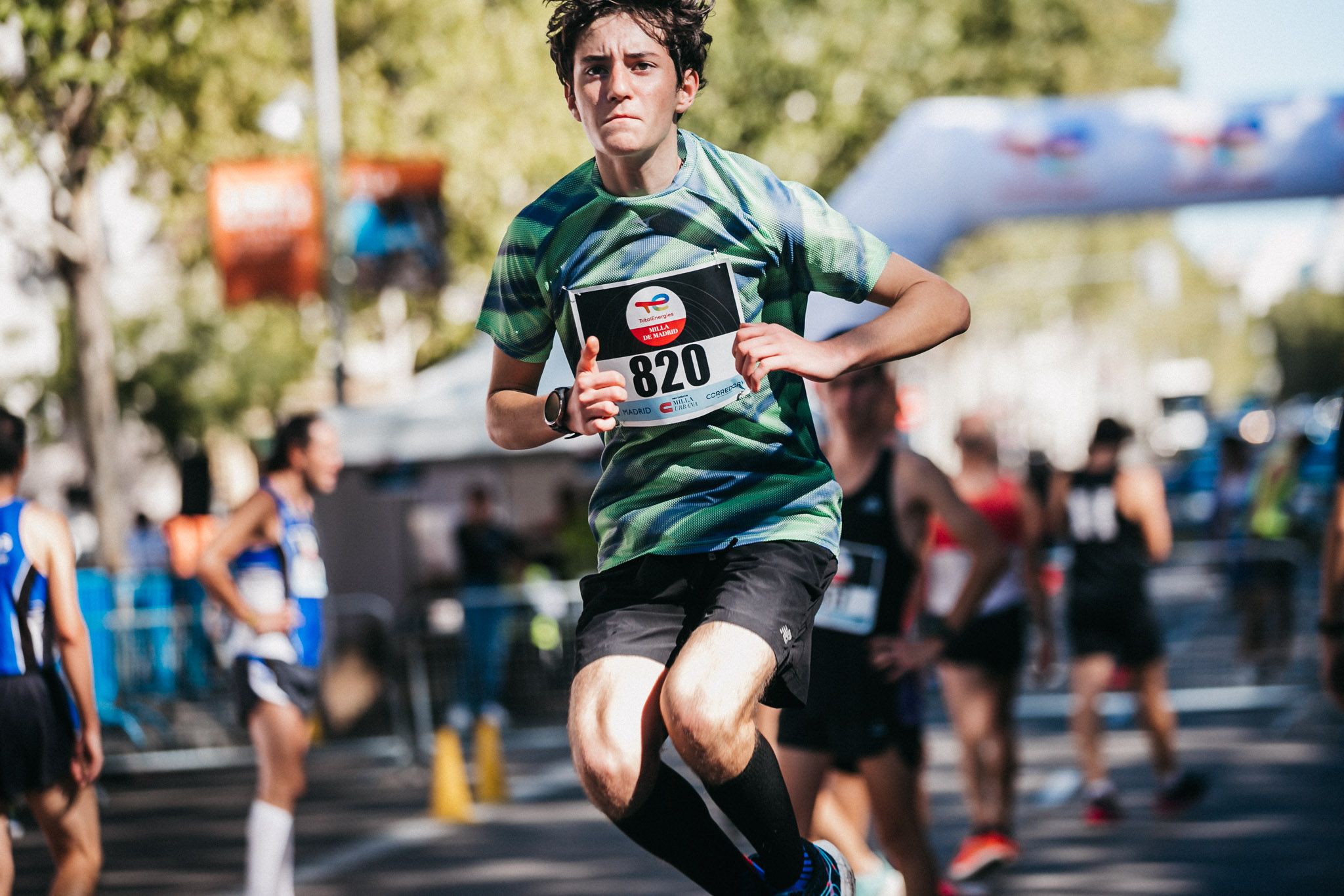 Las mejores fotos de las carreras populares en la TotalEnergies Milla de Madrid 2023. (154)