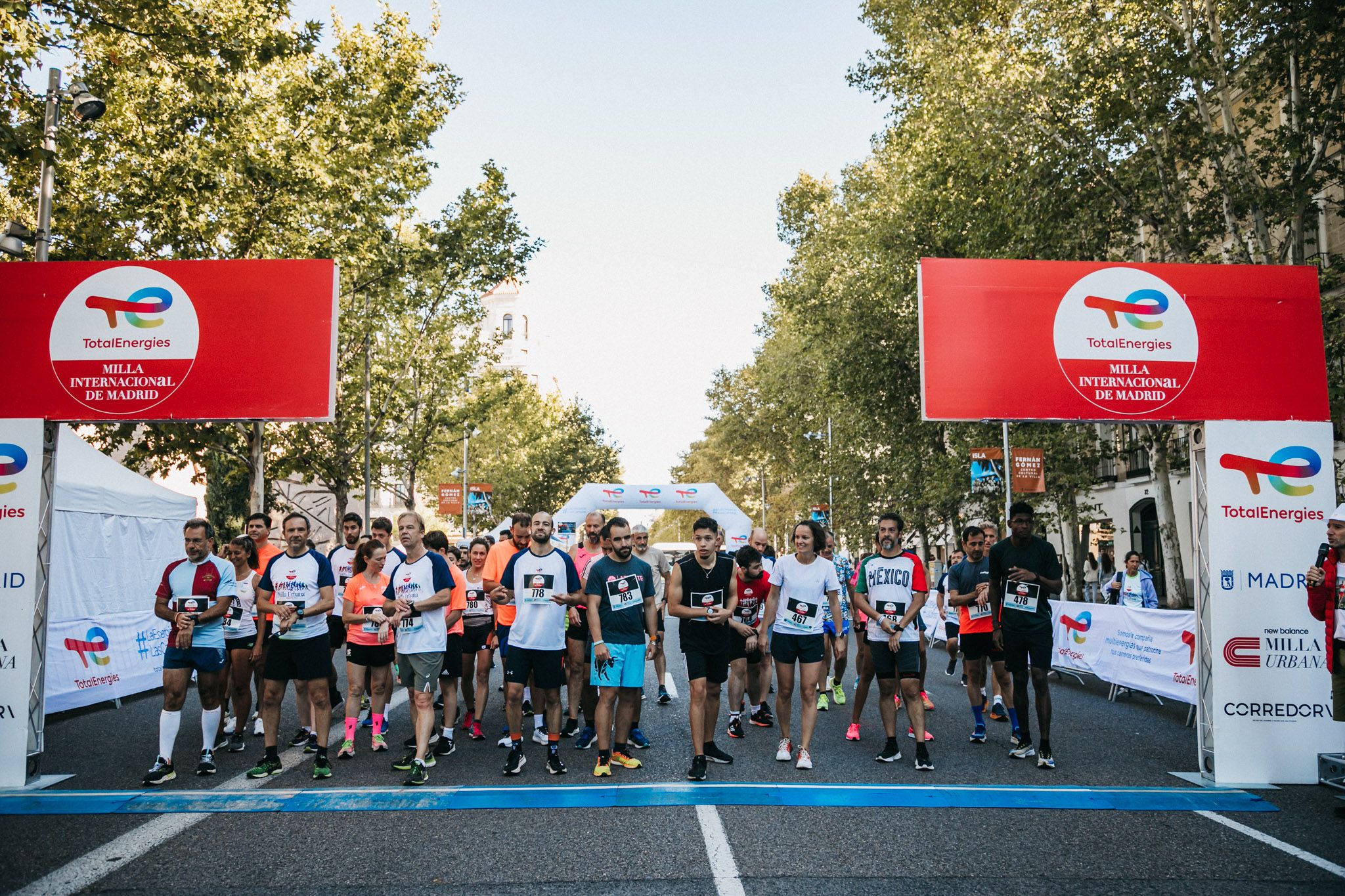 Las mejores fotos de las carreras populares en la TotalEnergies Milla Internacional de Madrid 2023. (209)