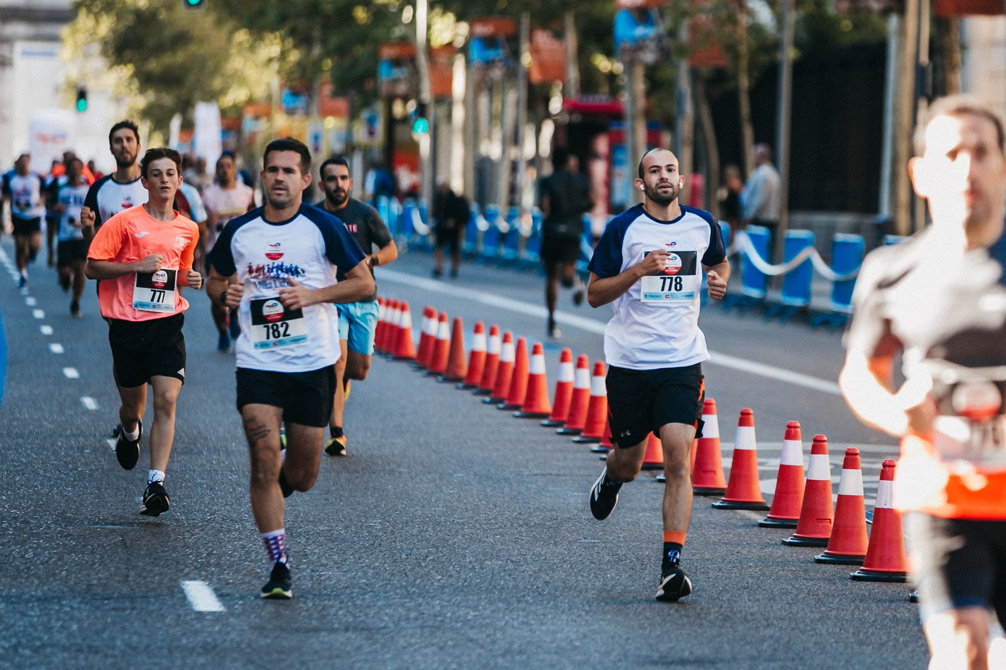 Las mejores fotos de las carreras populares en la TotalEnergies Milla Internacional de Madrid 2023. (233)