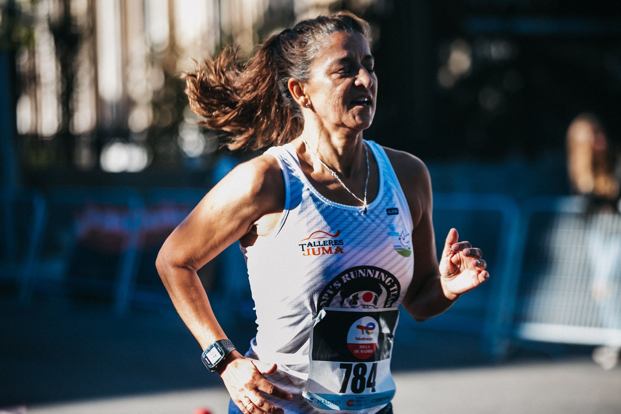 Las mejores fotos de las carreras populares en la TotalEnergies Milla Internacional de Madrid 2023. (240)