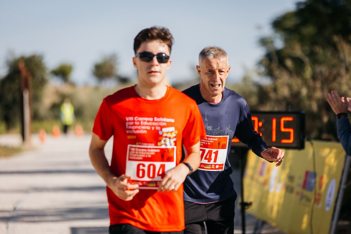 Las mejores fotos de la VIII Carrera Solidaria por la Educación financiera. Late mi Lente (141)