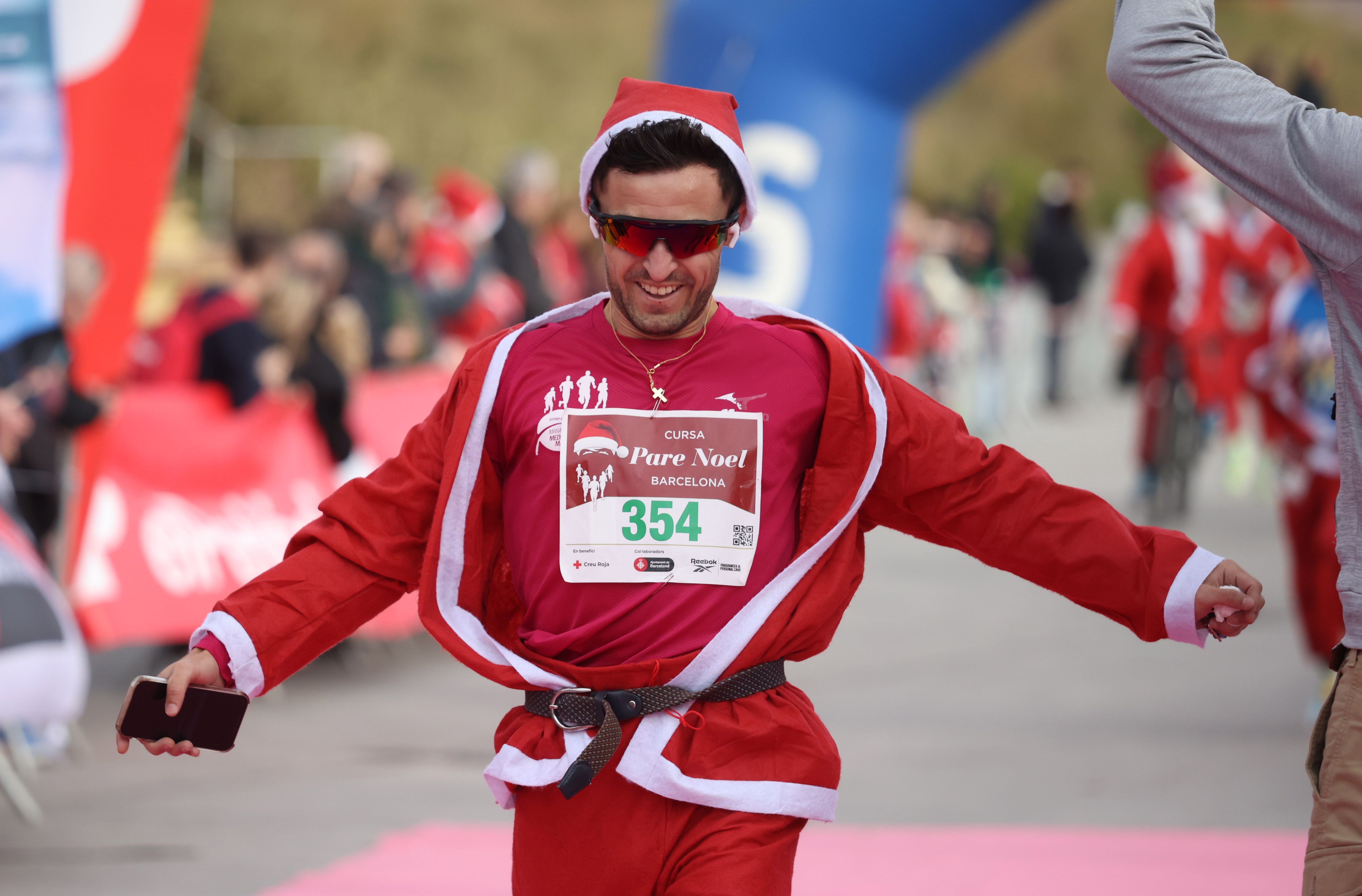 Las mejores fotos de la Carrera de Papá Noel de Barcelona 2024. 495