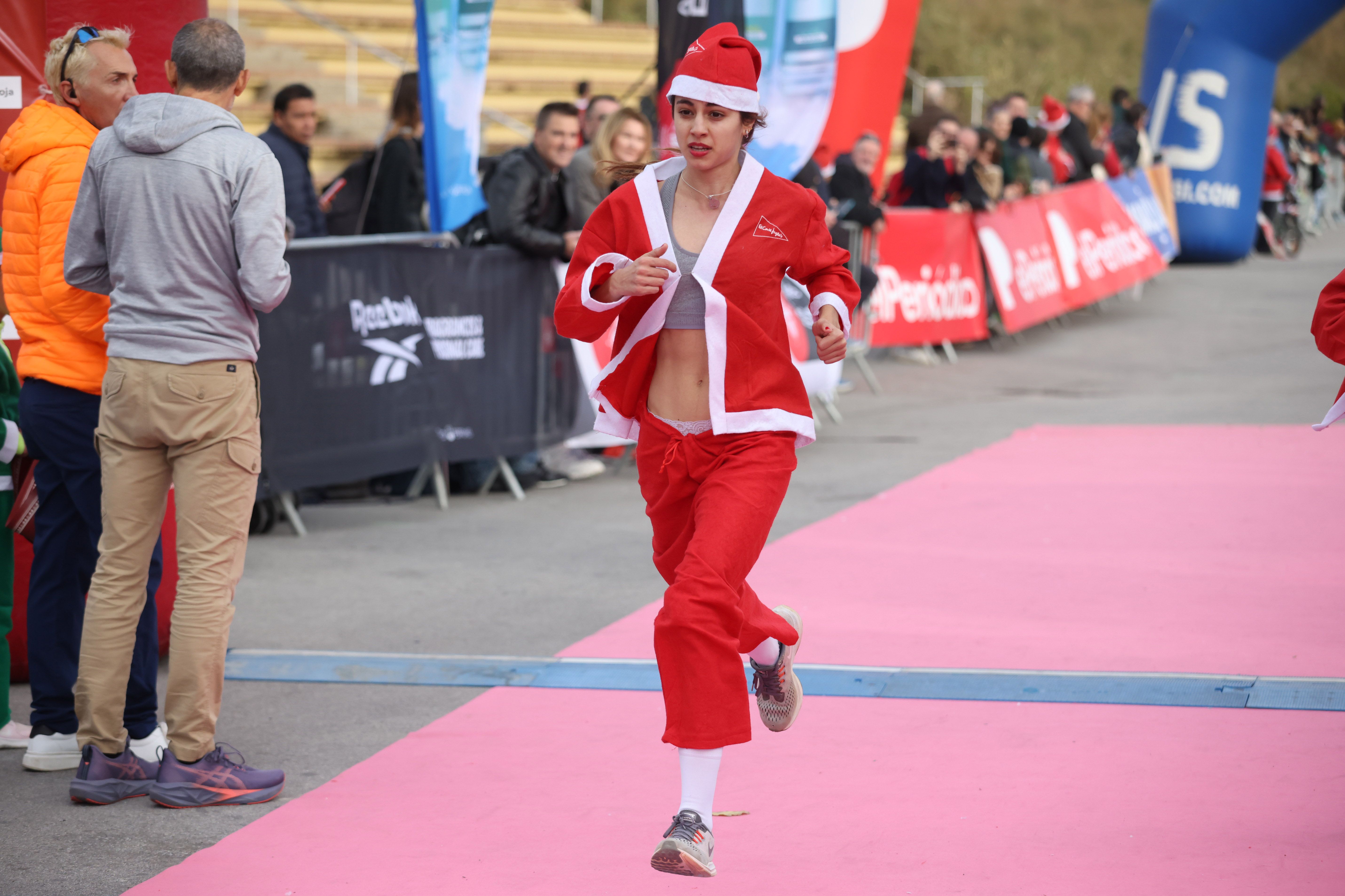 Las mejores fotos de la Carrera de Papá Noel de Barcelona 2024. 522