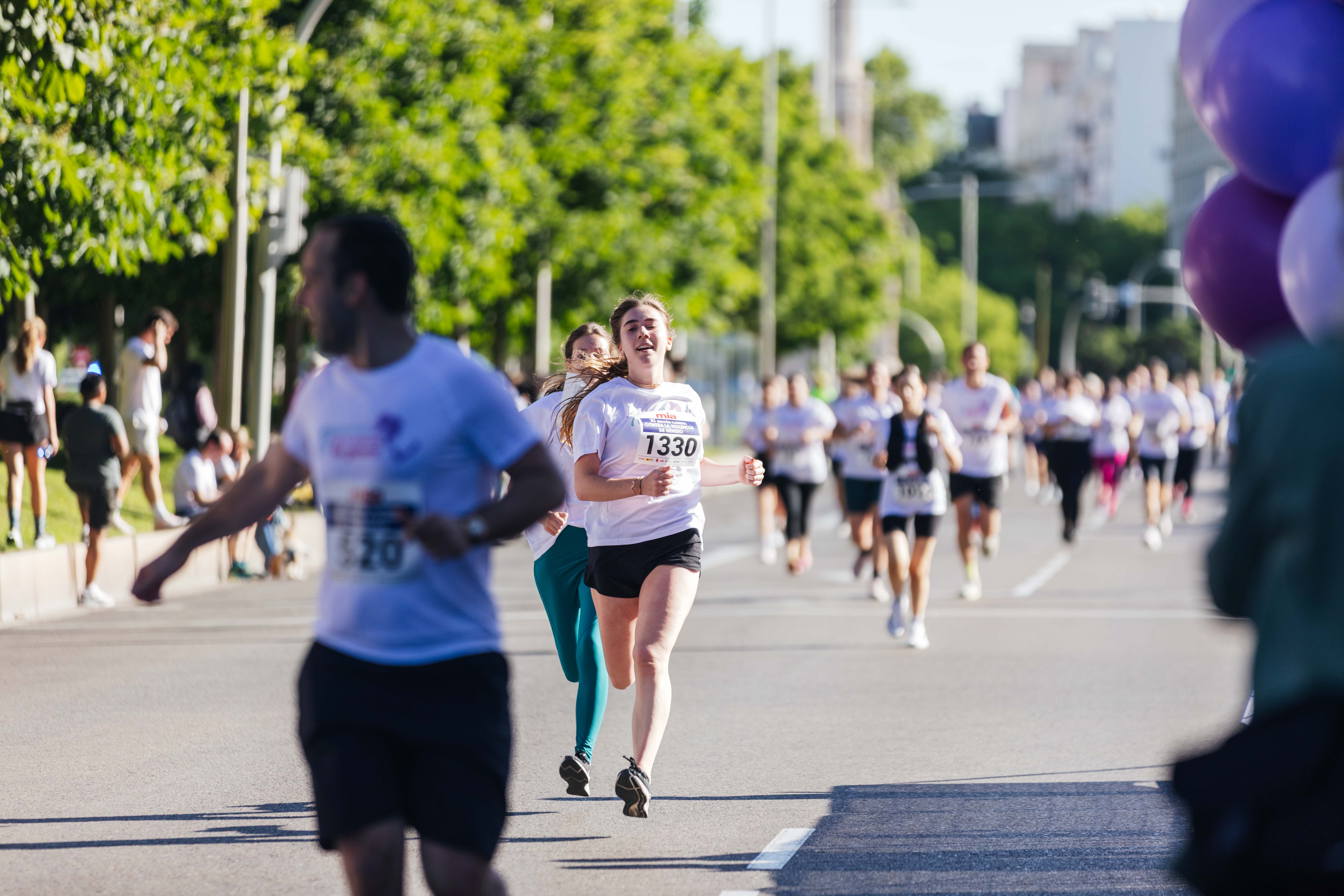 Las mejores fotos de la Carrera Contra la Violencia de Género. Meta 89