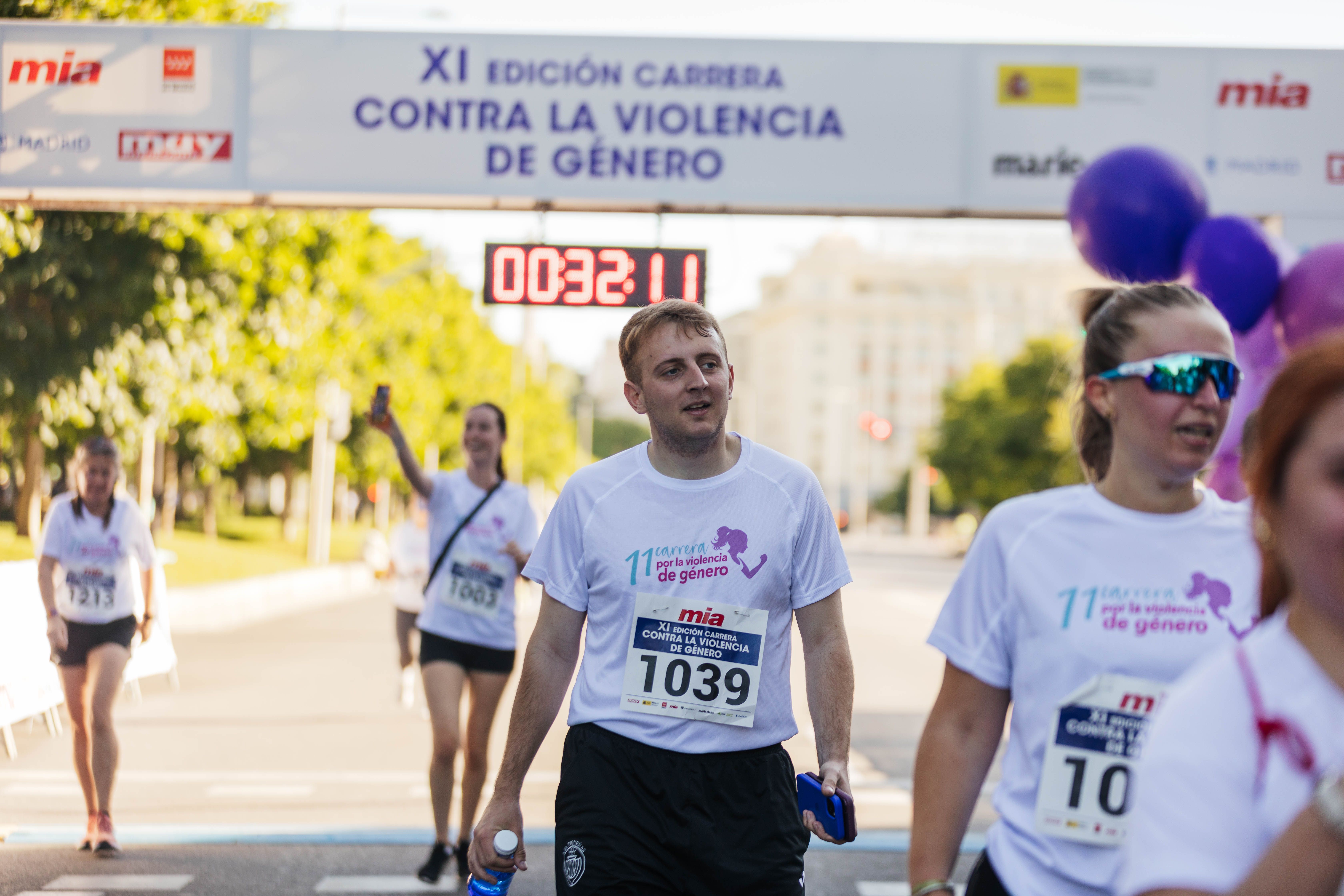 Las mejores fotos de la Carrera Contra la Violencia de Género. Meta 99