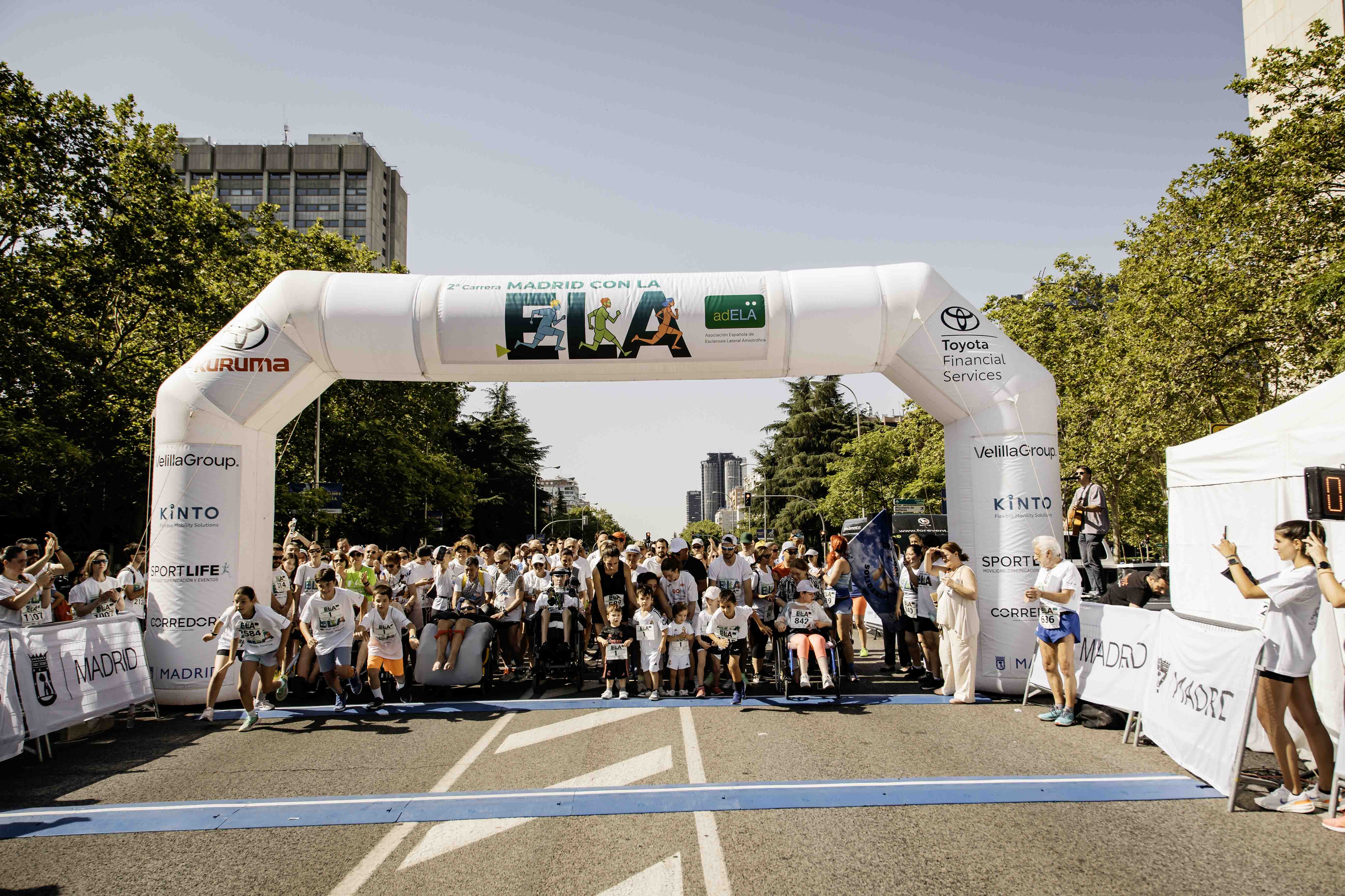 Las mejores fotos de la Carrera de la Superación celebara dentro de la Carrera Madrid con la ELA 6