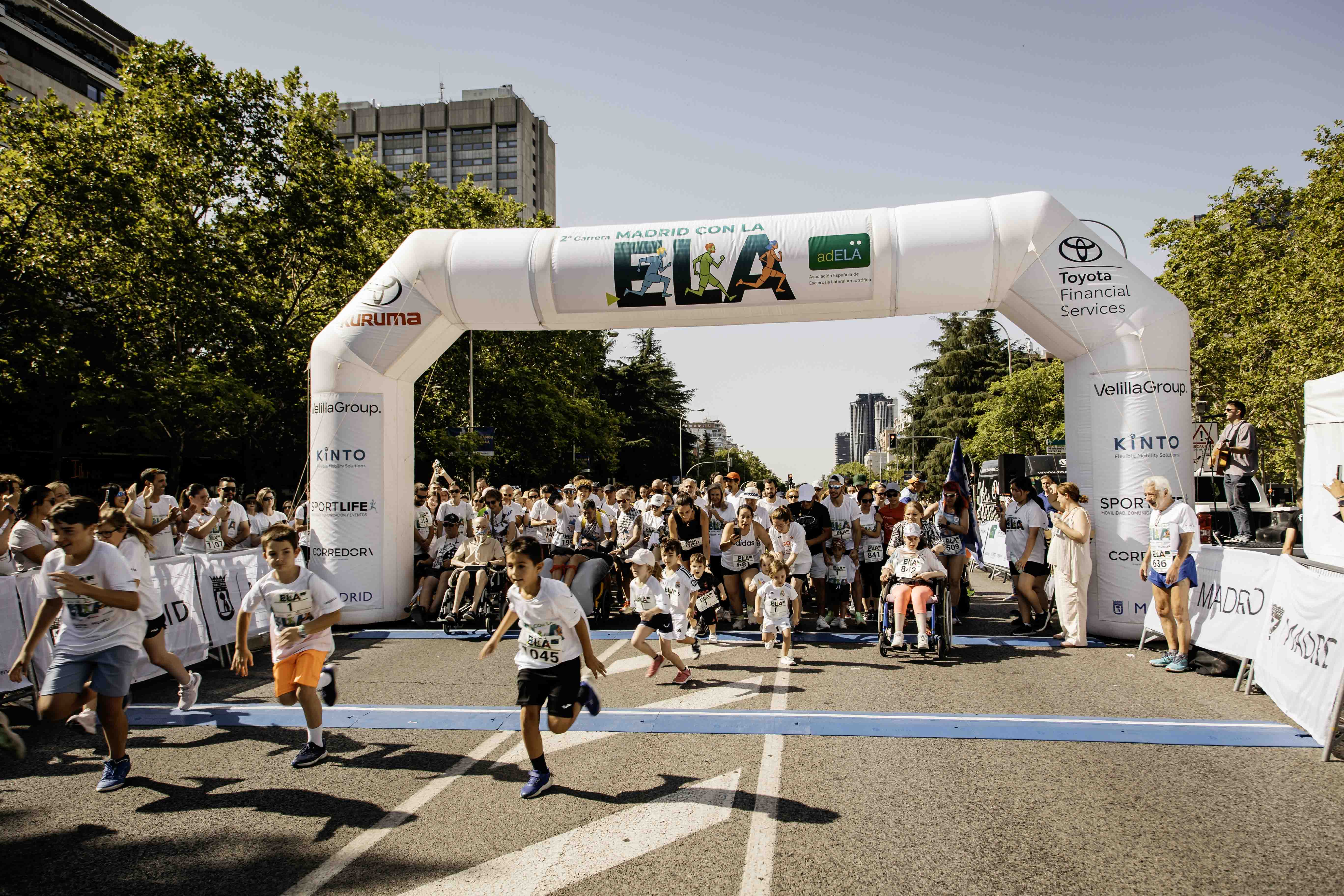 Las mejores fotos de la Carrera de la Superación celebara dentro de la Carrera Madrid con la ELA 7