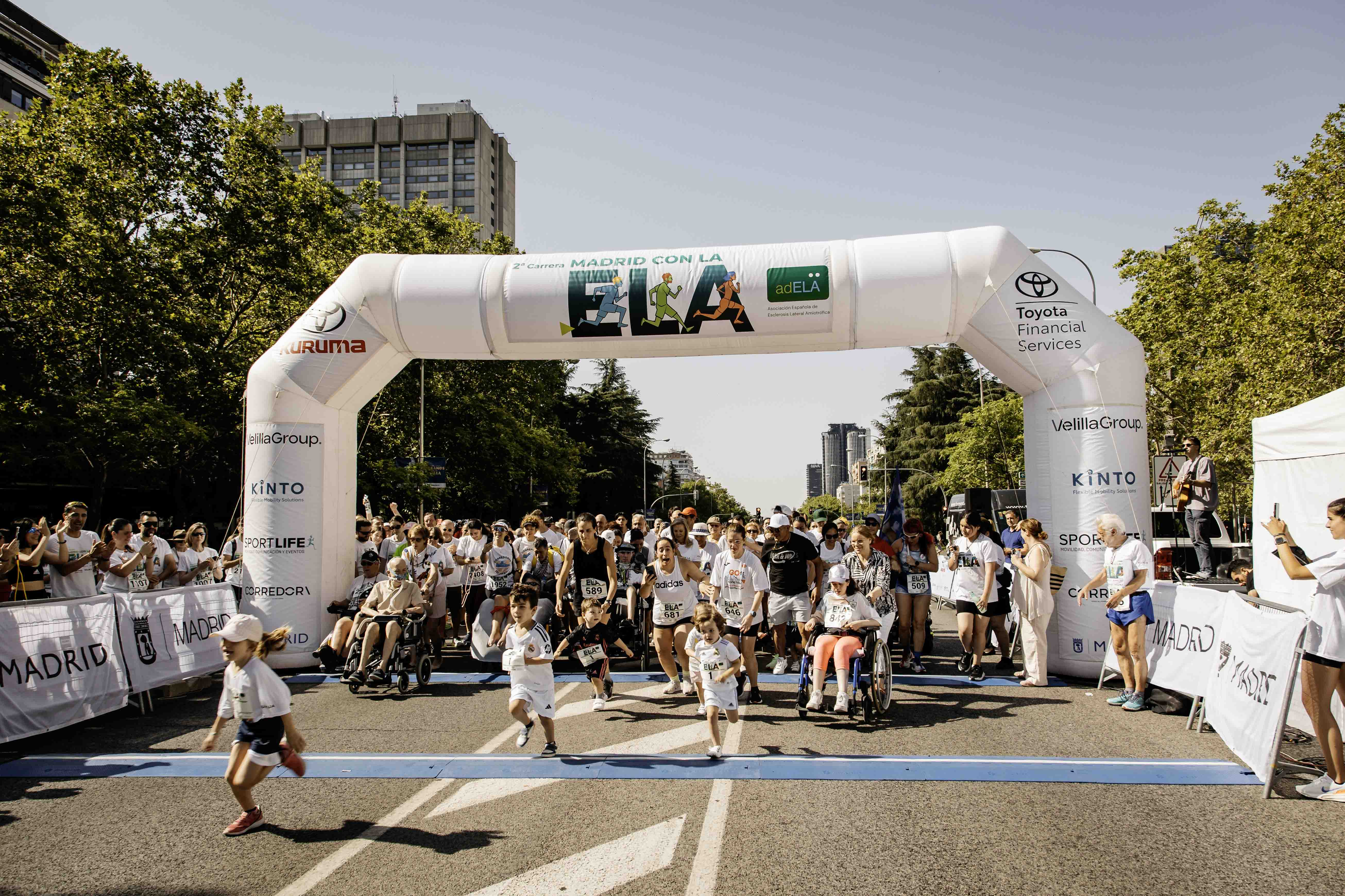 Las mejores fotos de la Carrera de la Superación celebara dentro de la Carrera Madrid con la ELA 8