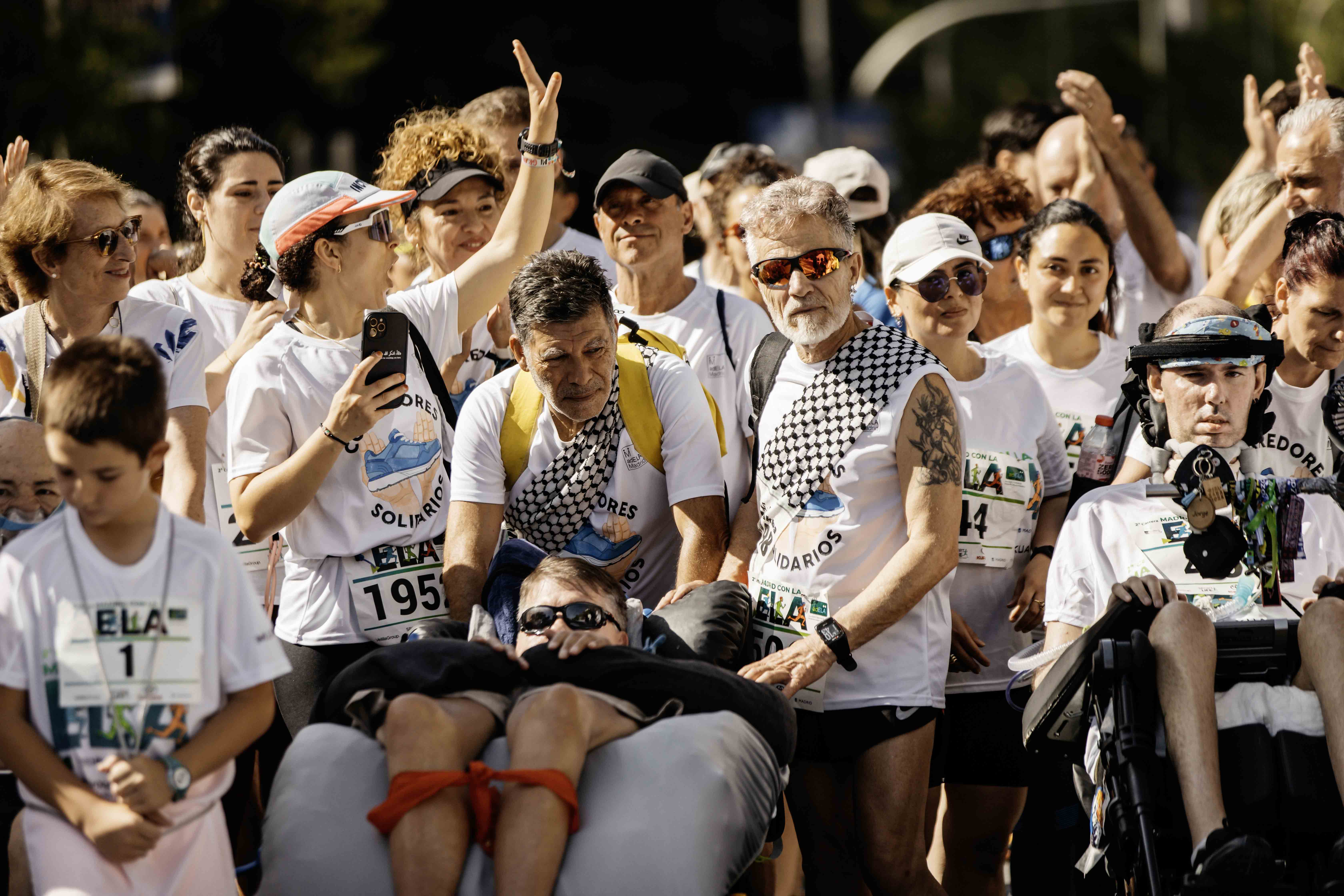 Las mejores fotos de la Carrera de la Superación celebara dentro de la Carrera Madrid con la ELA 9