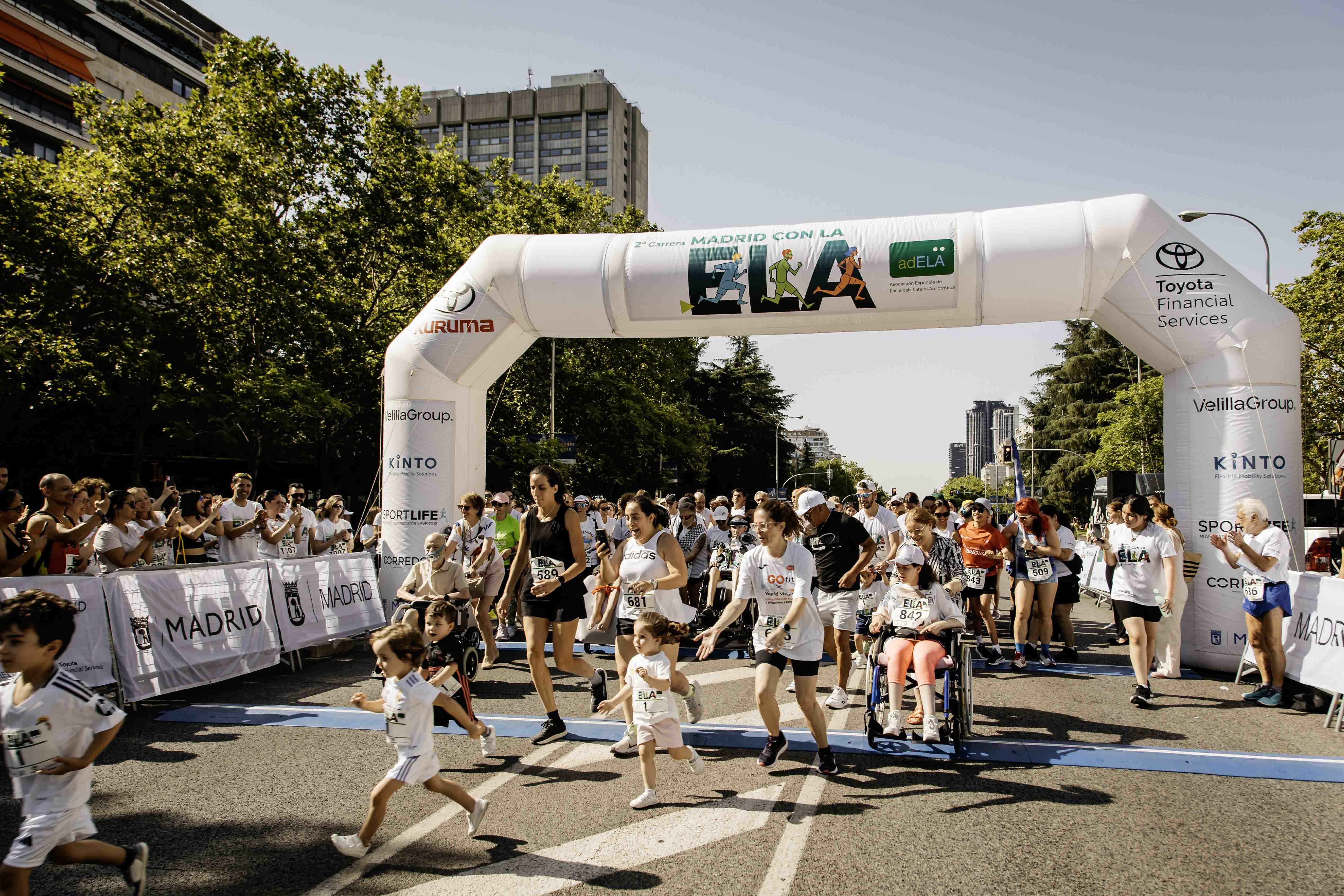 Las mejores fotos de la Carrera de la Superación celebara dentro de la Carrera Madrid con la ELA 10