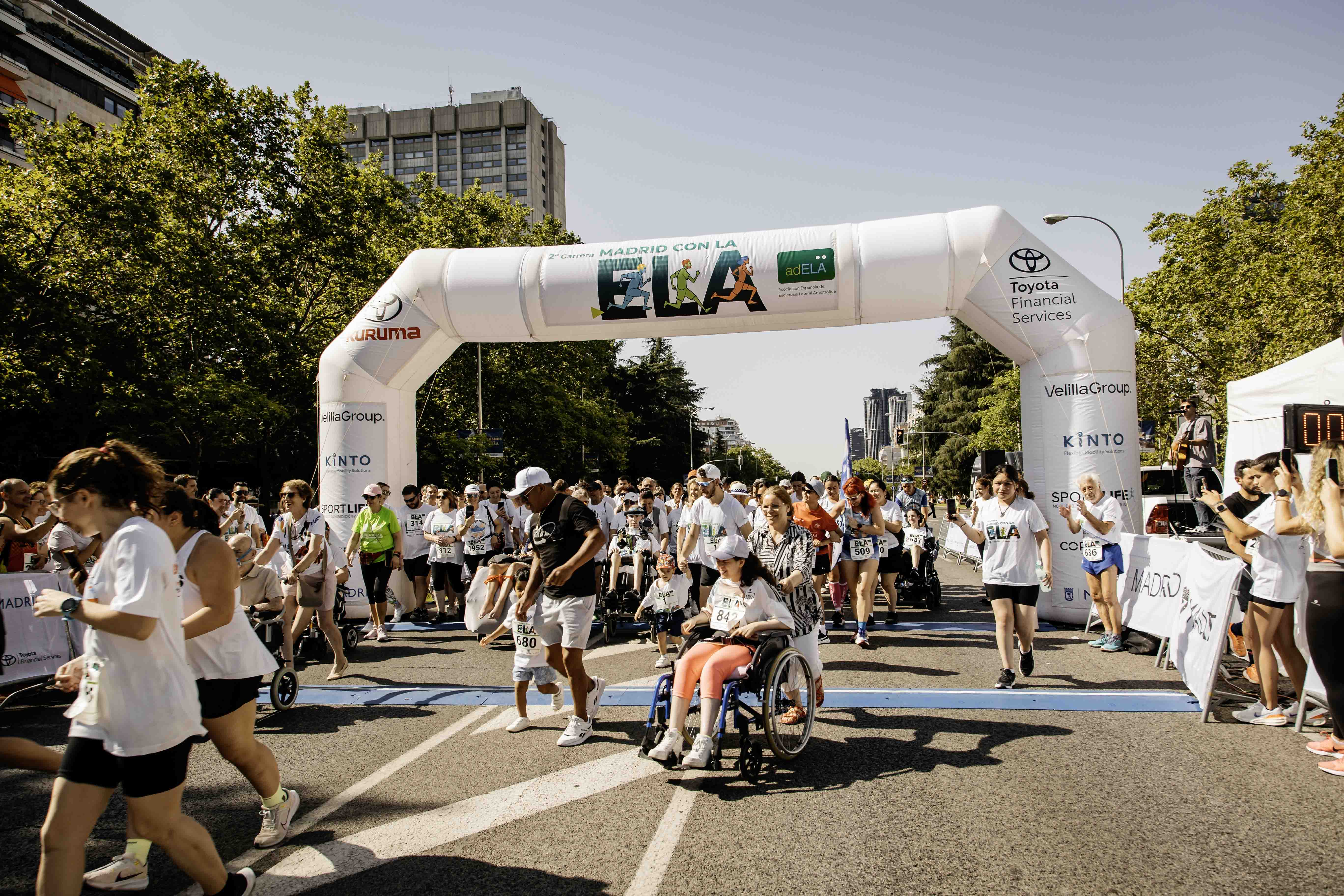 Las mejores fotos de la Carrera de la Superación celebara dentro de la Carrera Madrid con la ELA 12