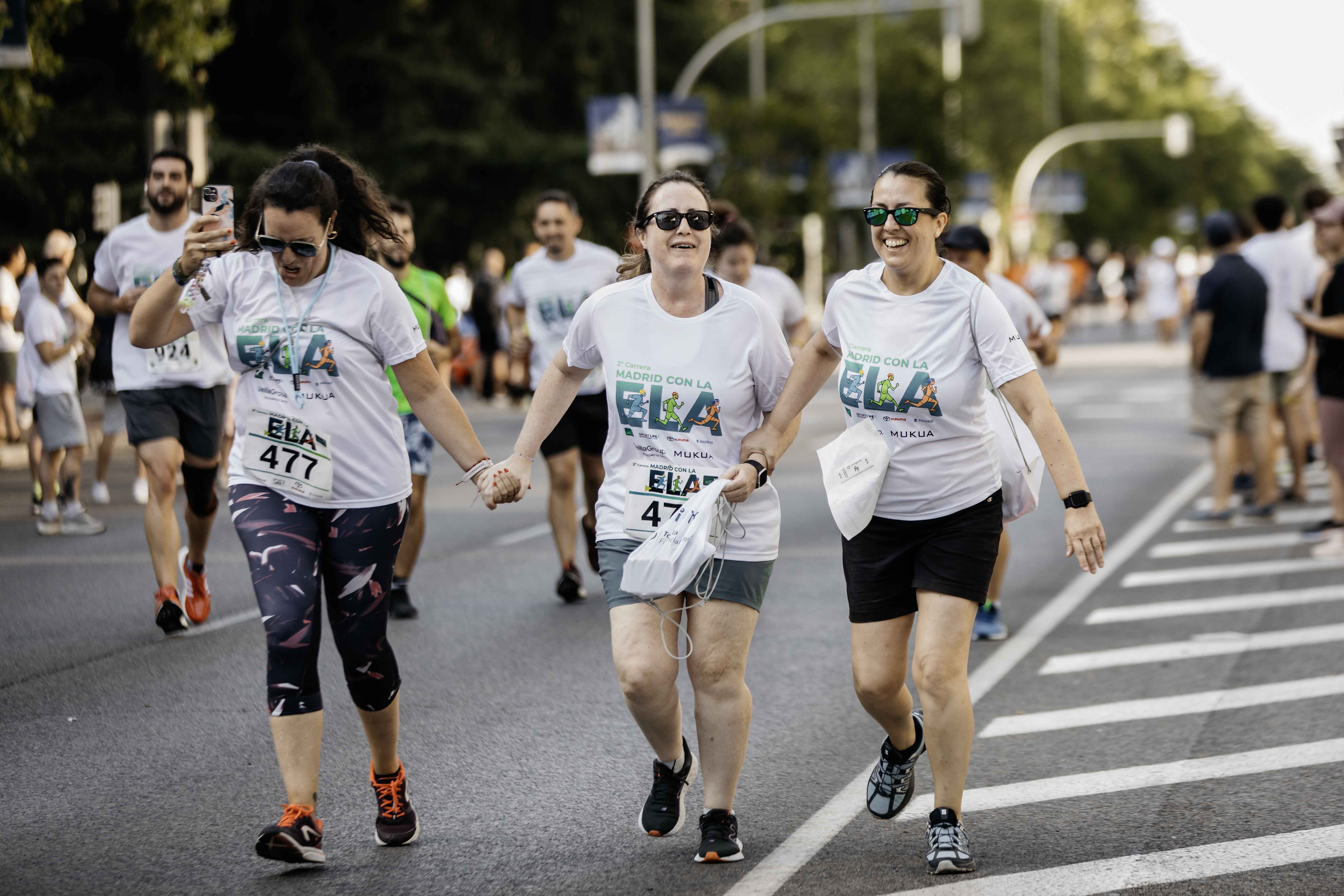 Las mejores fotos de la meta de la Carrera Madrid con la ELA 233