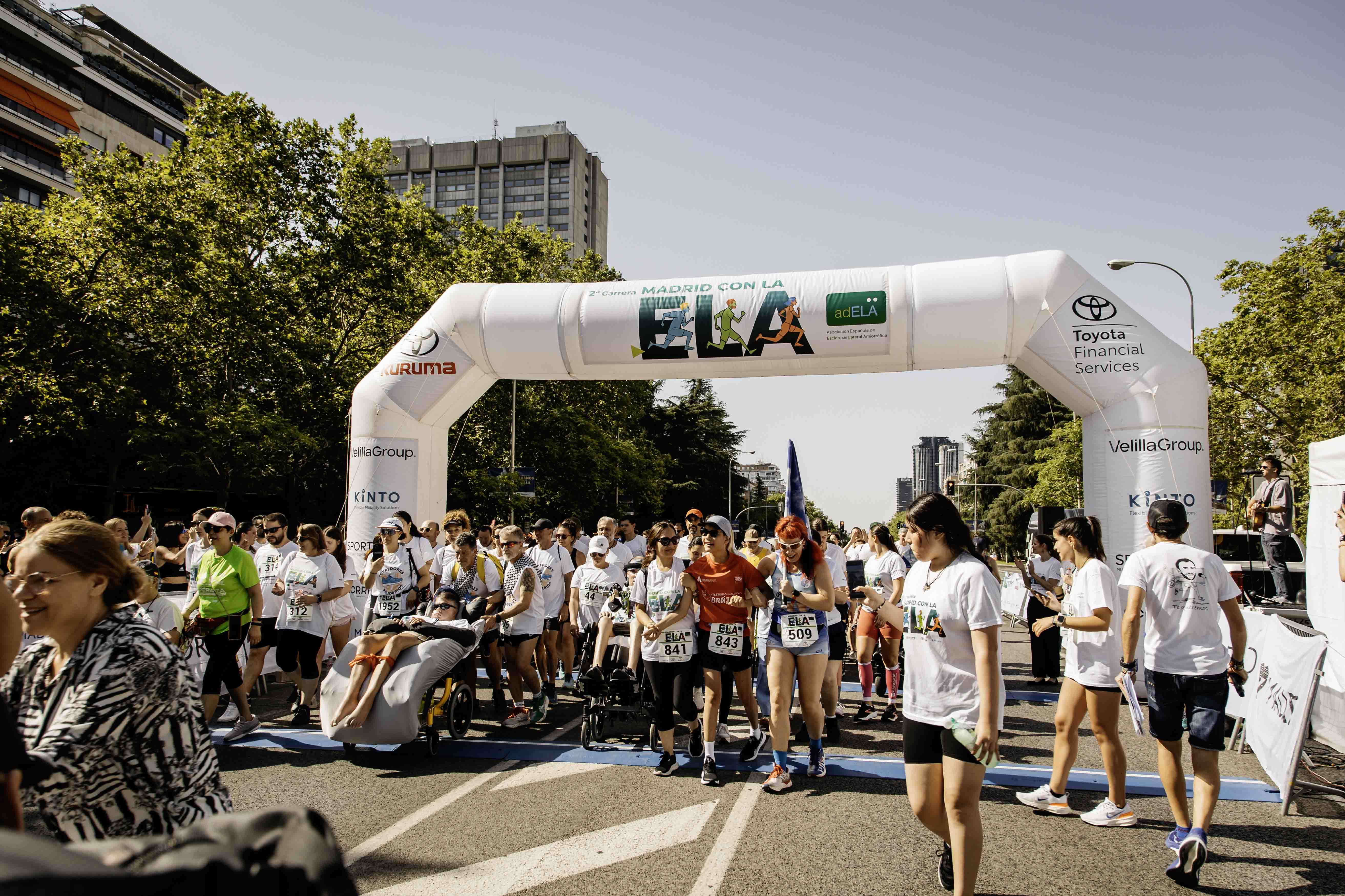 Las mejores fotos de la Carrera de la Superación celebara dentro de la Carrera Madrid con la ELA 16