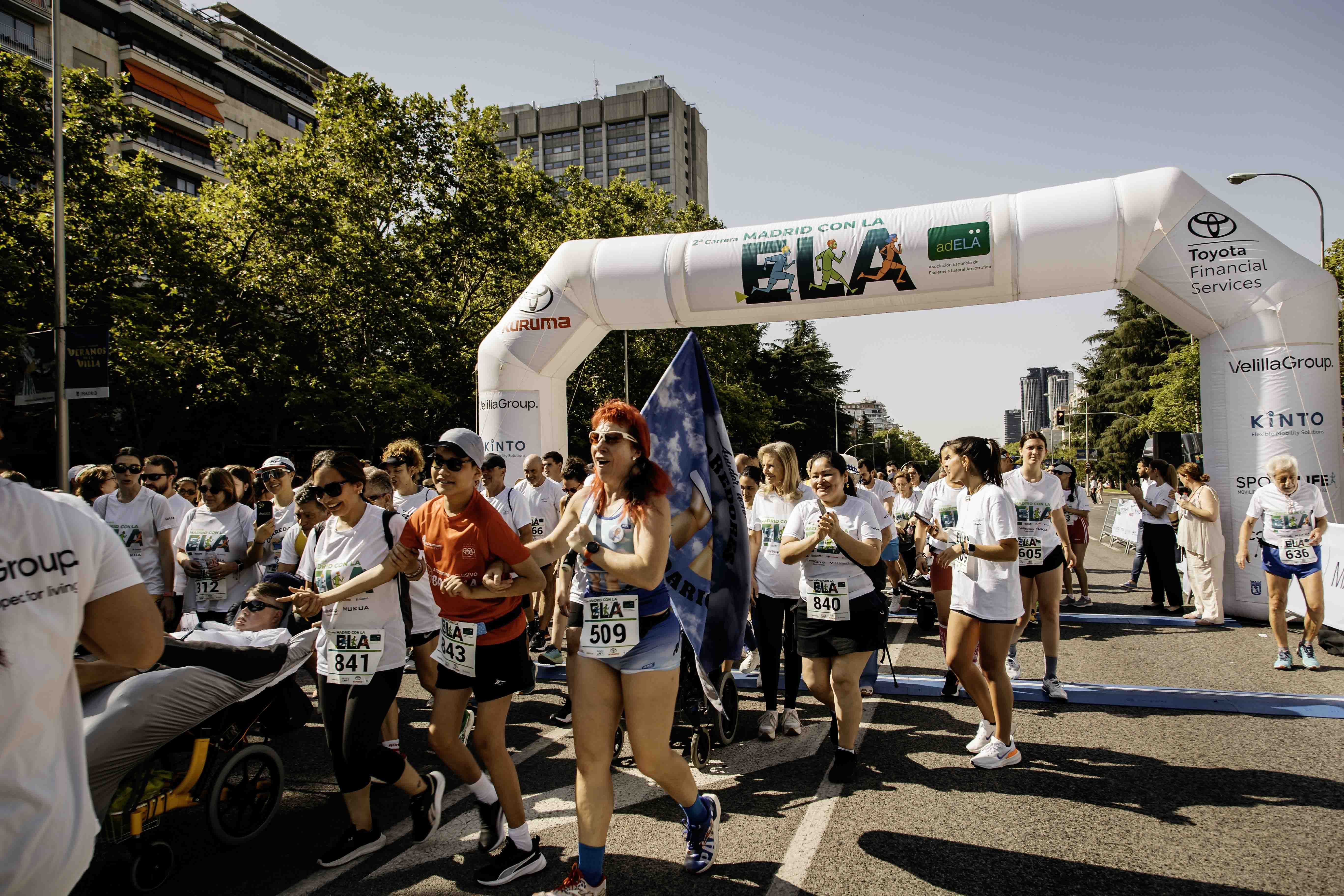 Las mejores fotos de la Carrera de la Superación celebara dentro de la Carrera Madrid con la ELA 18