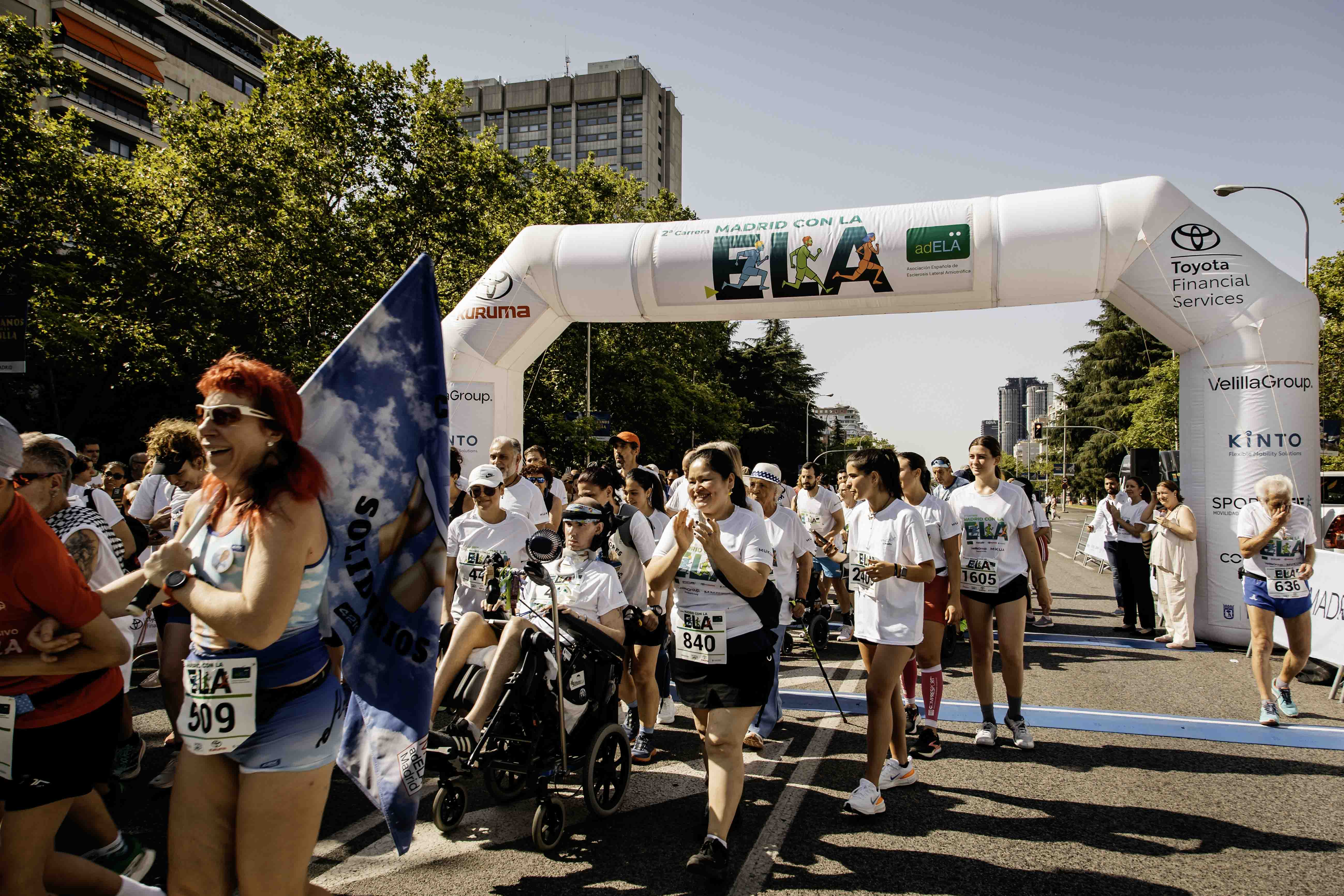 Las mejores fotos de la Carrera de la Superación celebara dentro de la Carrera Madrid con la ELA 20