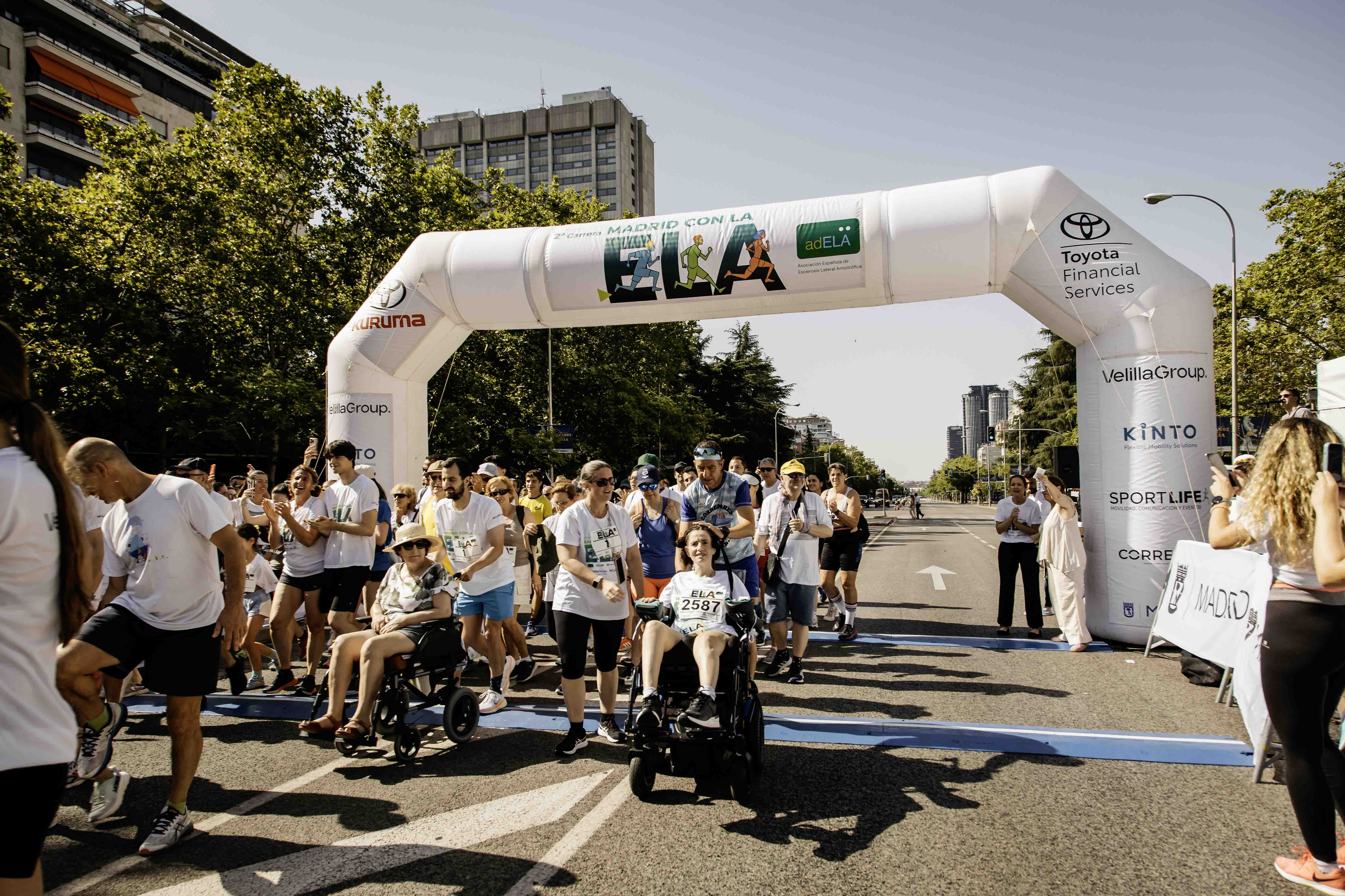 Las mejores fotos de la Carrera de la Superación celebara dentro de la Carrera Madrid con la ELA 21