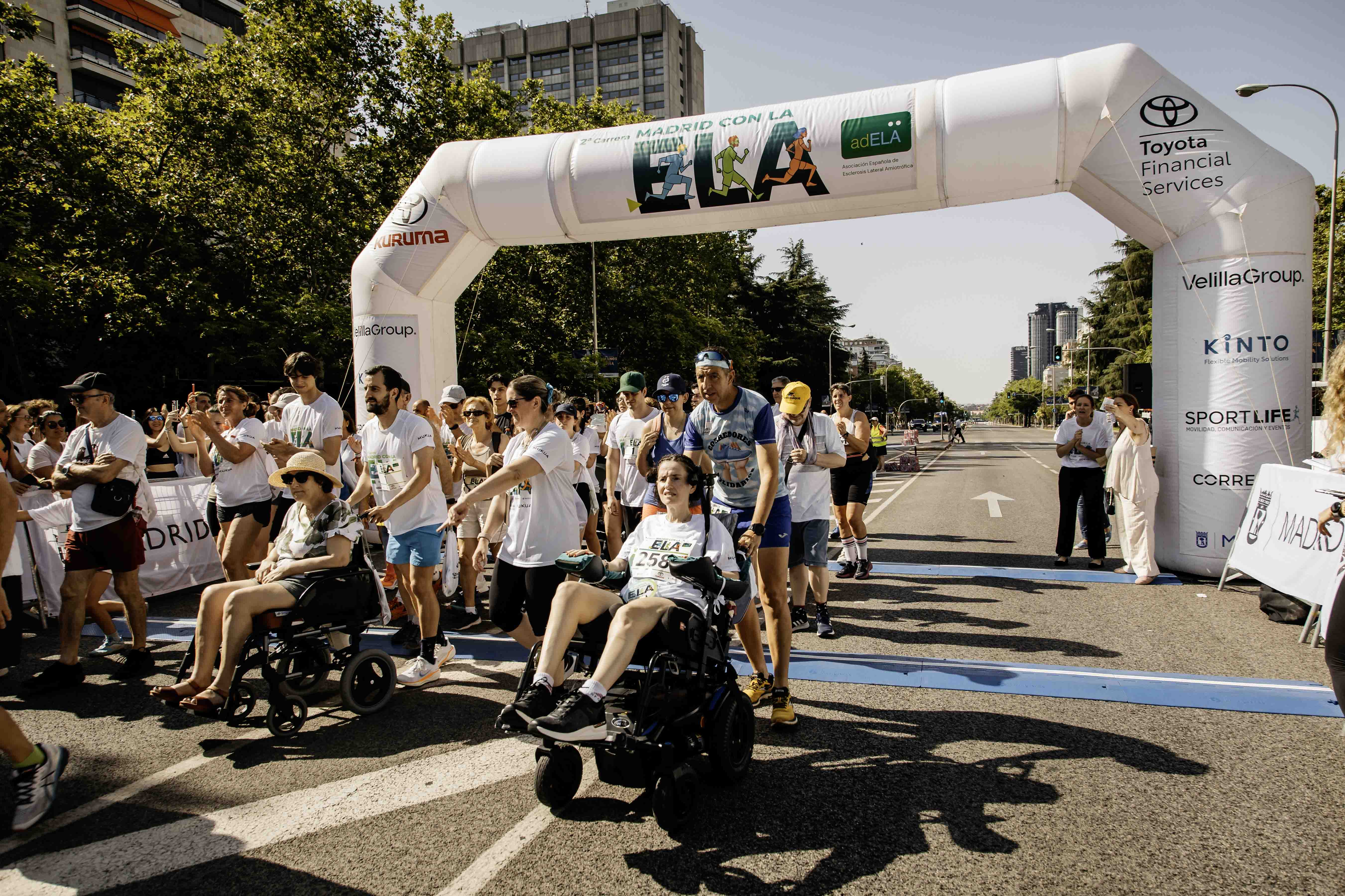 Las mejores fotos de la Carrera de la Superación celebara dentro de la Carrera Madrid con la ELA 22