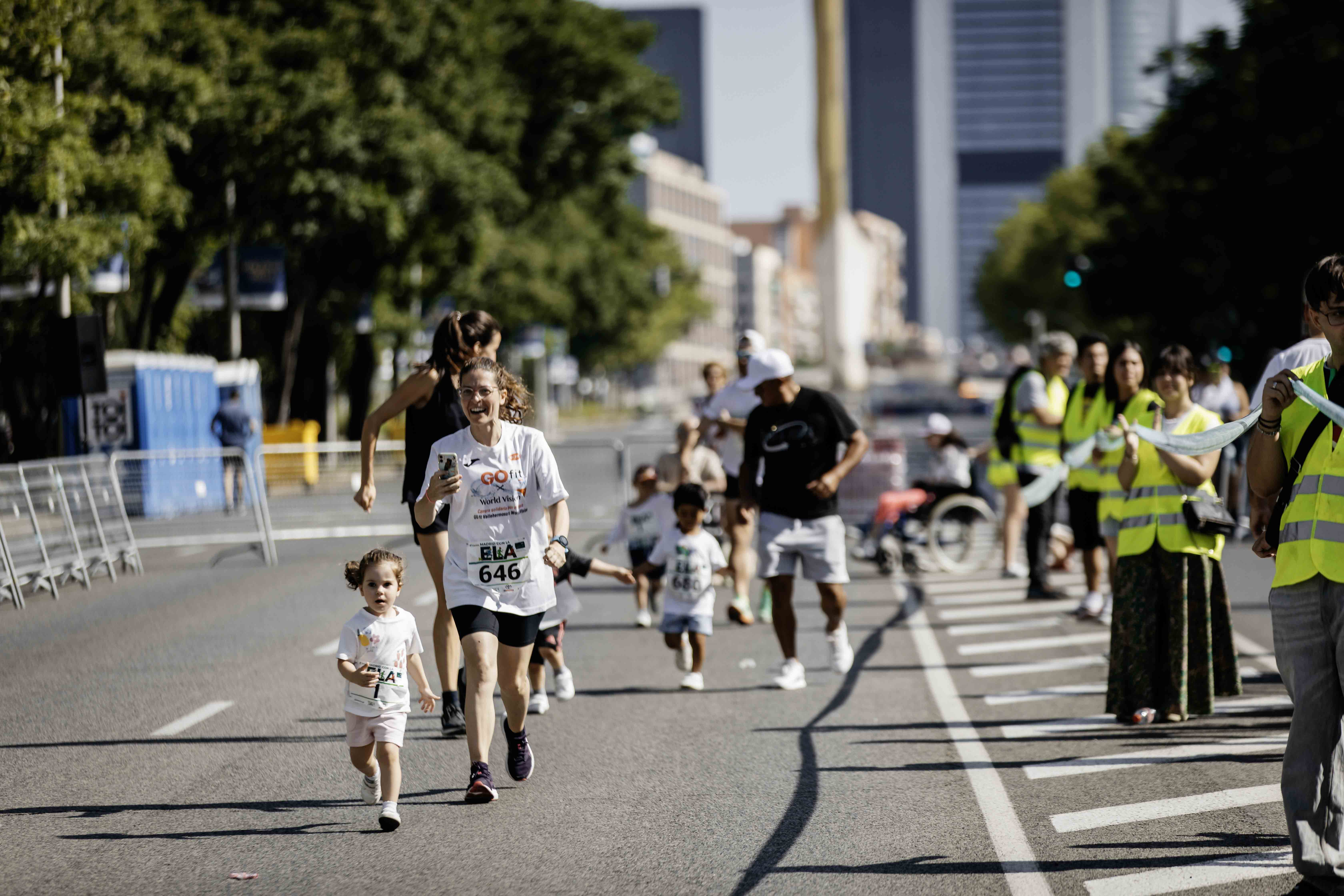 Las mejores fotos de la Carrera de la Superación celebara dentro de la Carrera Madrid con la ELA 24