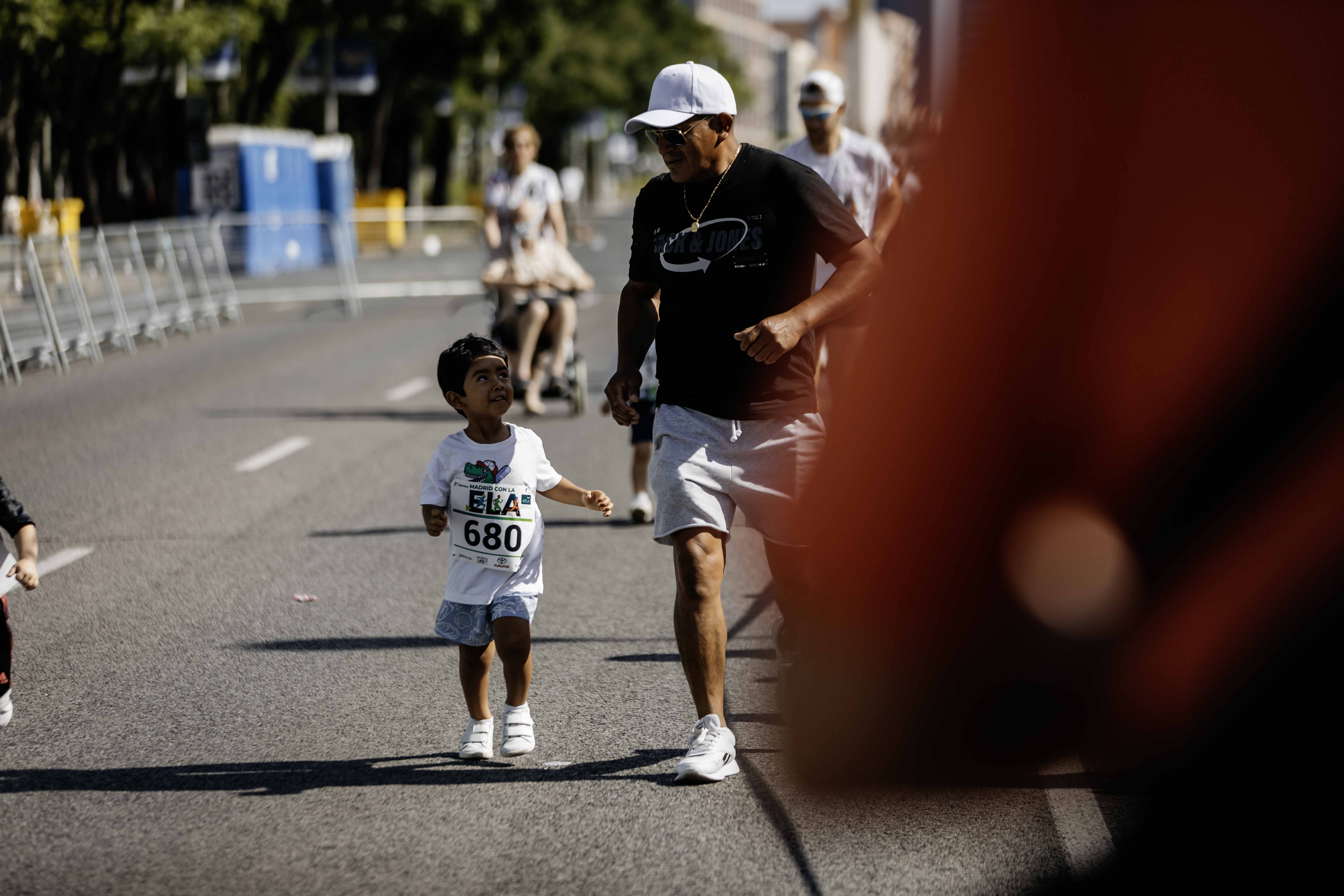 Las mejores fotos de la Carrera de la Superación celebara dentro de la Carrera Madrid con la ELA 27