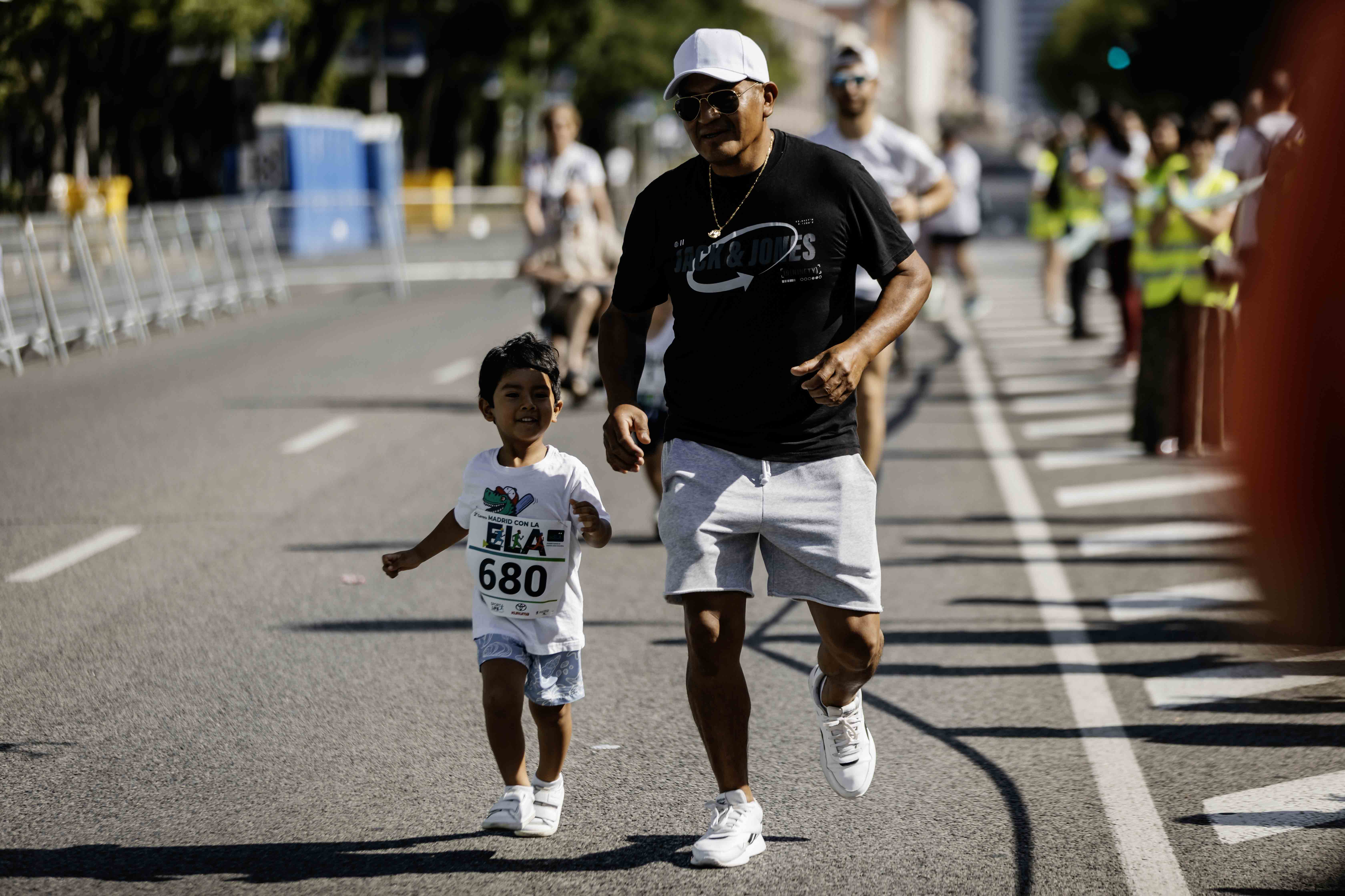 Las mejores fotos de la Carrera de la Superación celebara dentro de la Carrera Madrid con la ELA 28