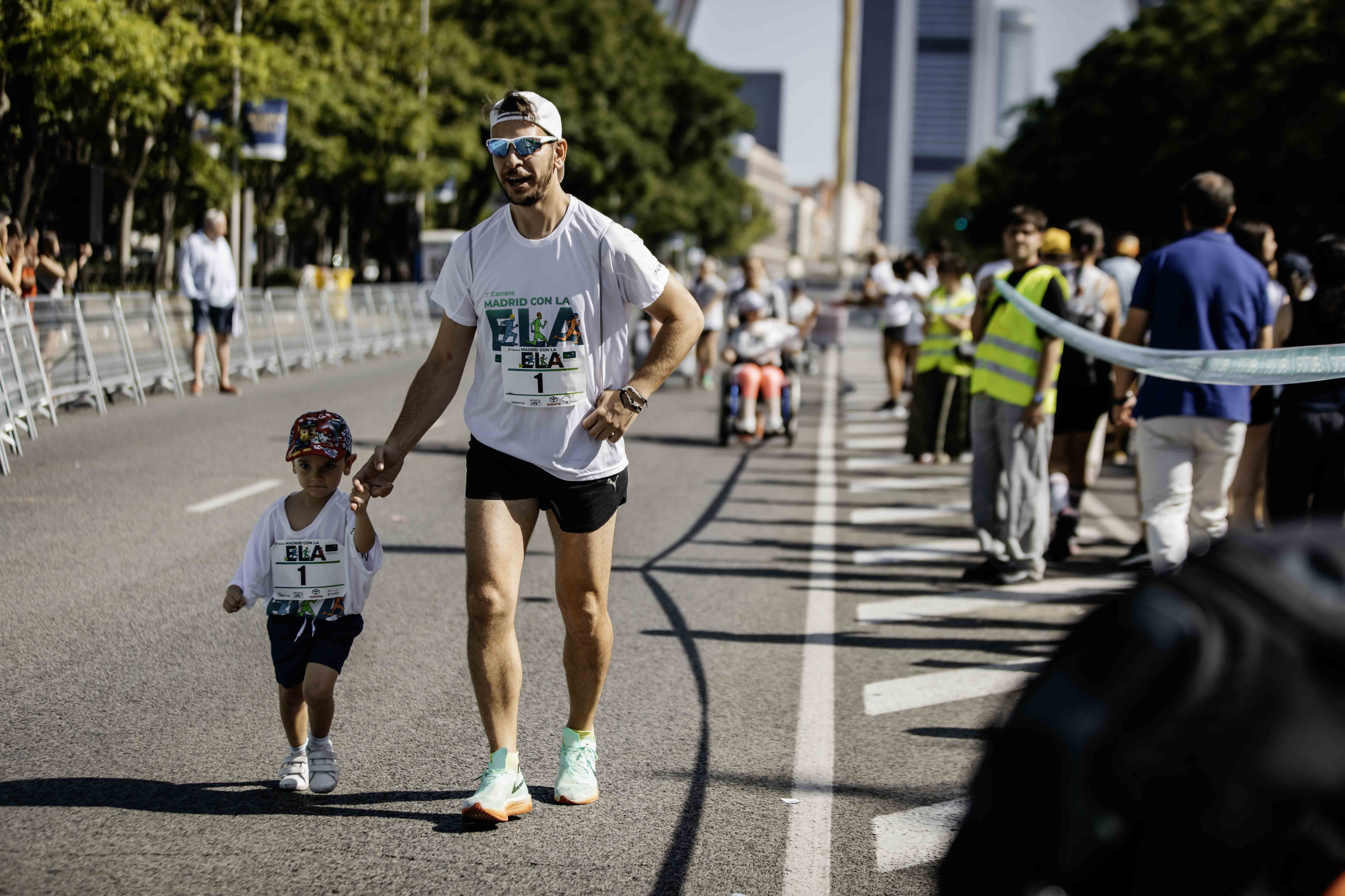 Las mejores fotos de la Carrera de la Superación celebara dentro de la Carrera Madrid con la ELA 29