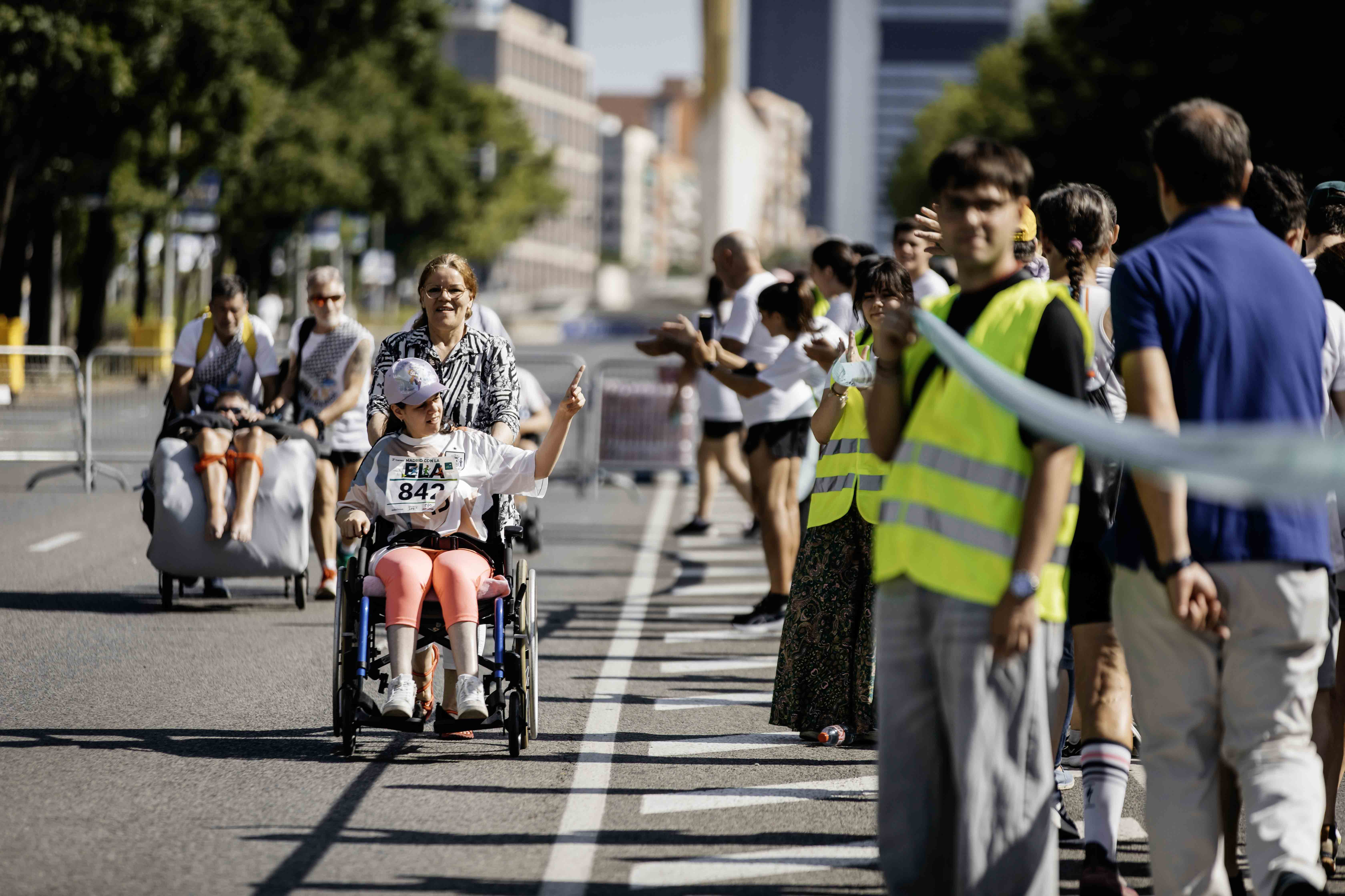 Las mejores fotos de la Carrera de la Superación celebara dentro de la Carrera Madrid con la ELA 30
